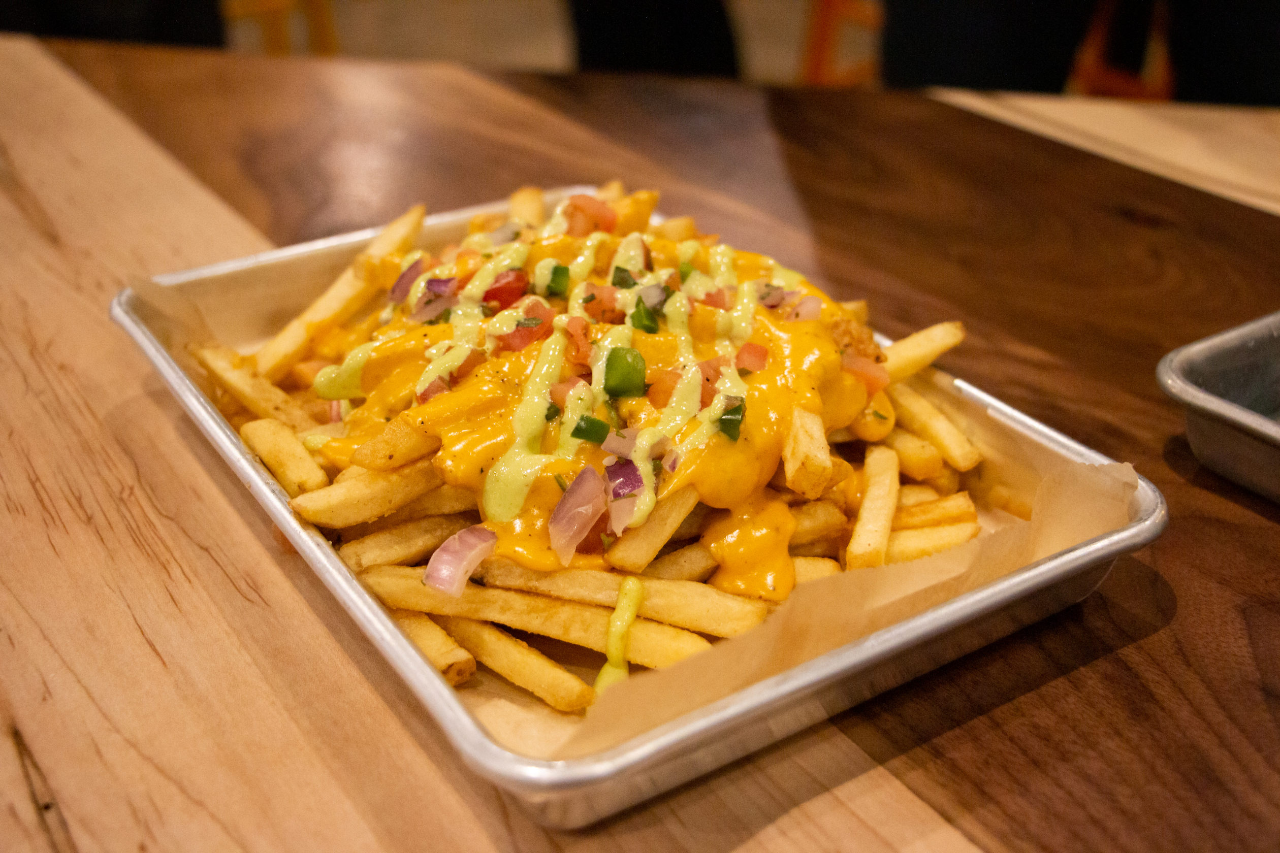 Denver Beer Company will open its fourth taproom on Feb. 25 located in the Lowry neighborhood at 7070 E. Lowry Blvd., Denver. Pictured: Queso fries. (SavannahMehrtenssavannah.mehrtens@denvergazette.comhttps://secure.gravatar.com/avatar/e0e72b1f57c381b73731db78749ceca8?d=mm&r=g)