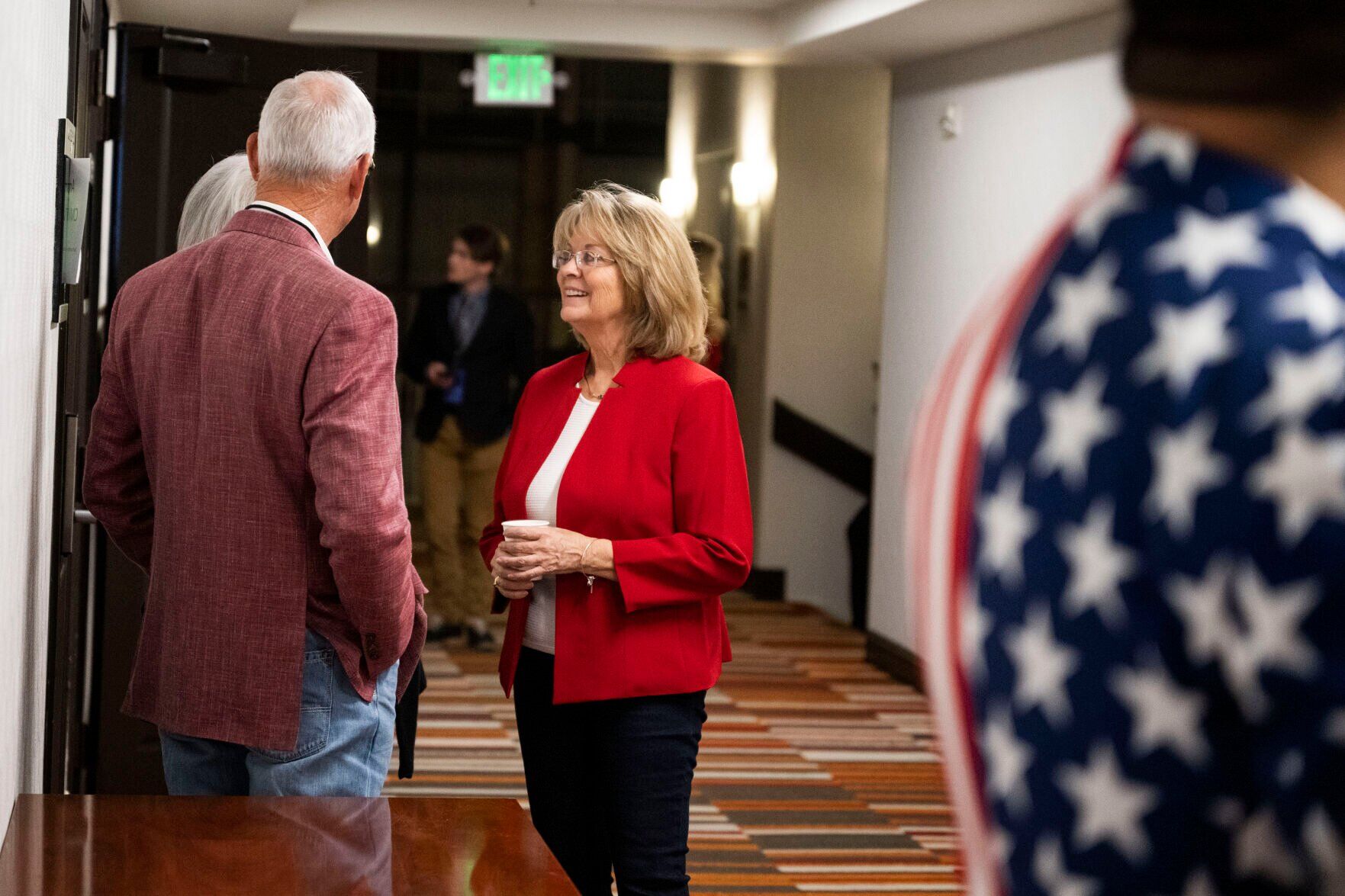 Colorado Republican 23rd District congressional candidate Barbara Kirkmeyer, center, visits in the hallway outside her hotel room during the Colorado GOP Election Night Party on Tuesday, Nov. 8, 2022, at the DoubleTree by Hilton DTC in Greenwood Village, Colo. (Timothy Hurst/The Gazette) (TIMOTHY HURST/DENVER GAZETTE)