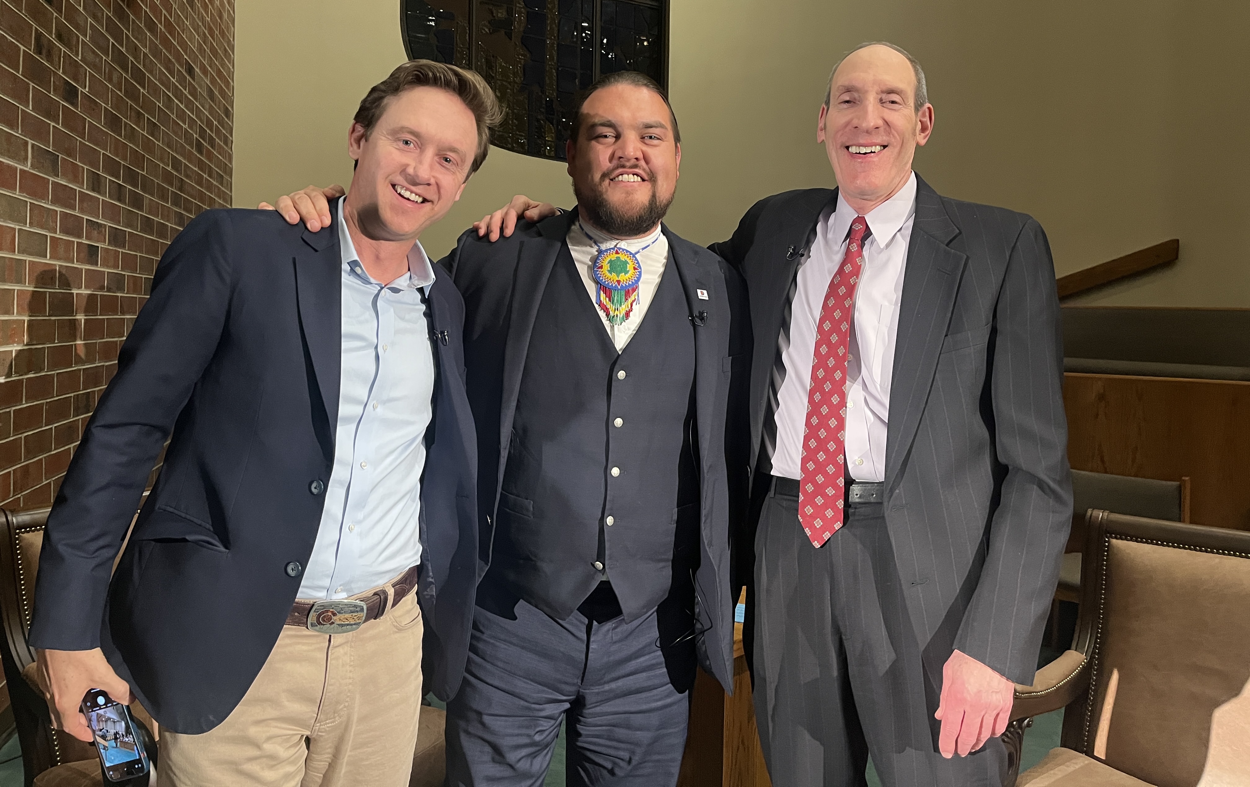 Ean Tafoya and Mike Johnston after a forum hosted by Aaron Harber and PBS 12. (Alex Edwards/The Denver Gazette).