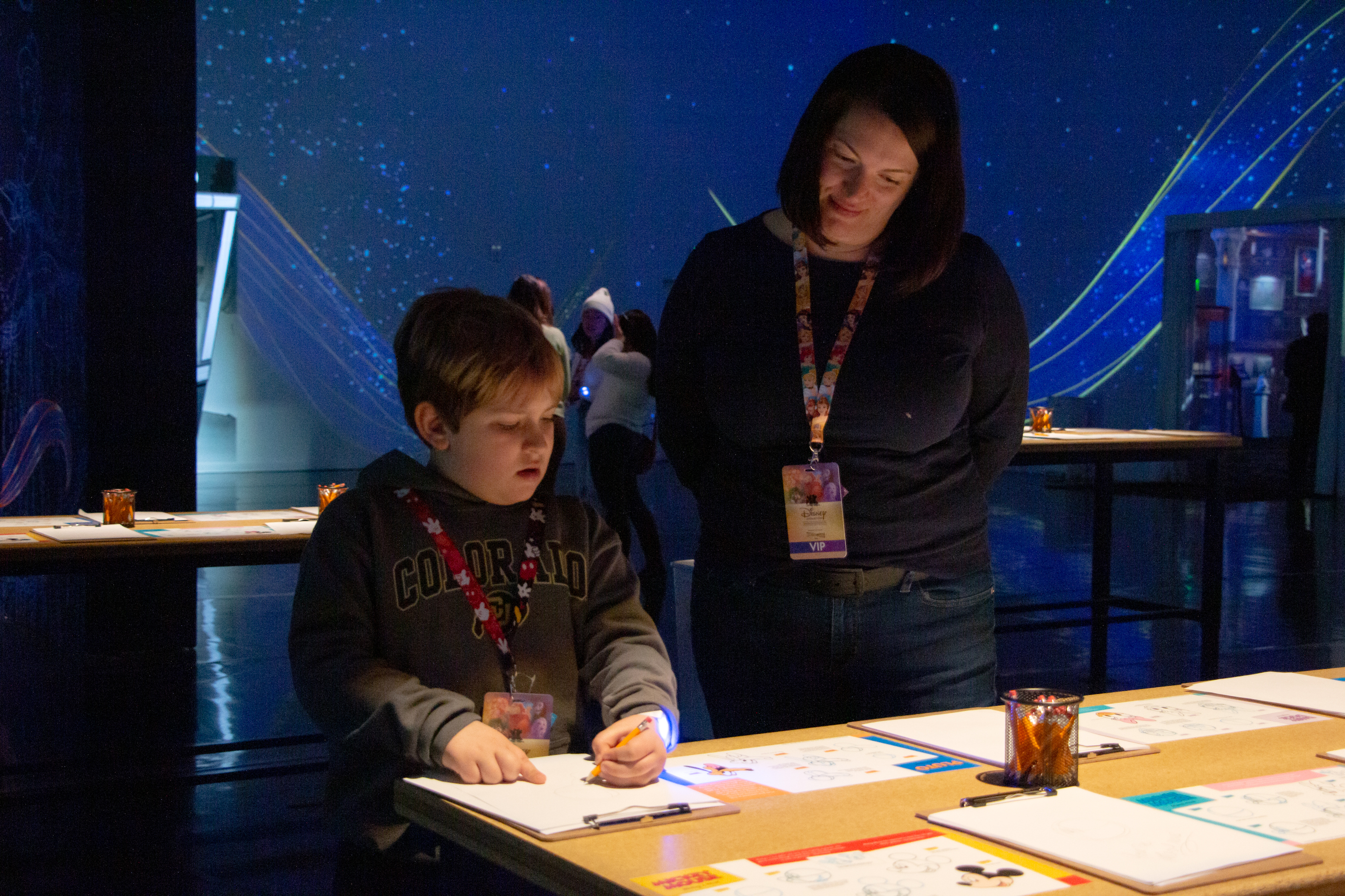 Kirsty Daviau and her son Henry drew Disney characters at the new Disney Animation: Immersive Experience Wednesday. It is now open at Lighthouse ArtSpace Denver, 3900 Elati St. on Feb. 15. (SavannahMehrtenssavannah.mehrtens@denvergazette.comhttps://secure.gravatar.com/avatar/e0e72b1f57c381b73731db78749ceca8?d=mm&r=g)