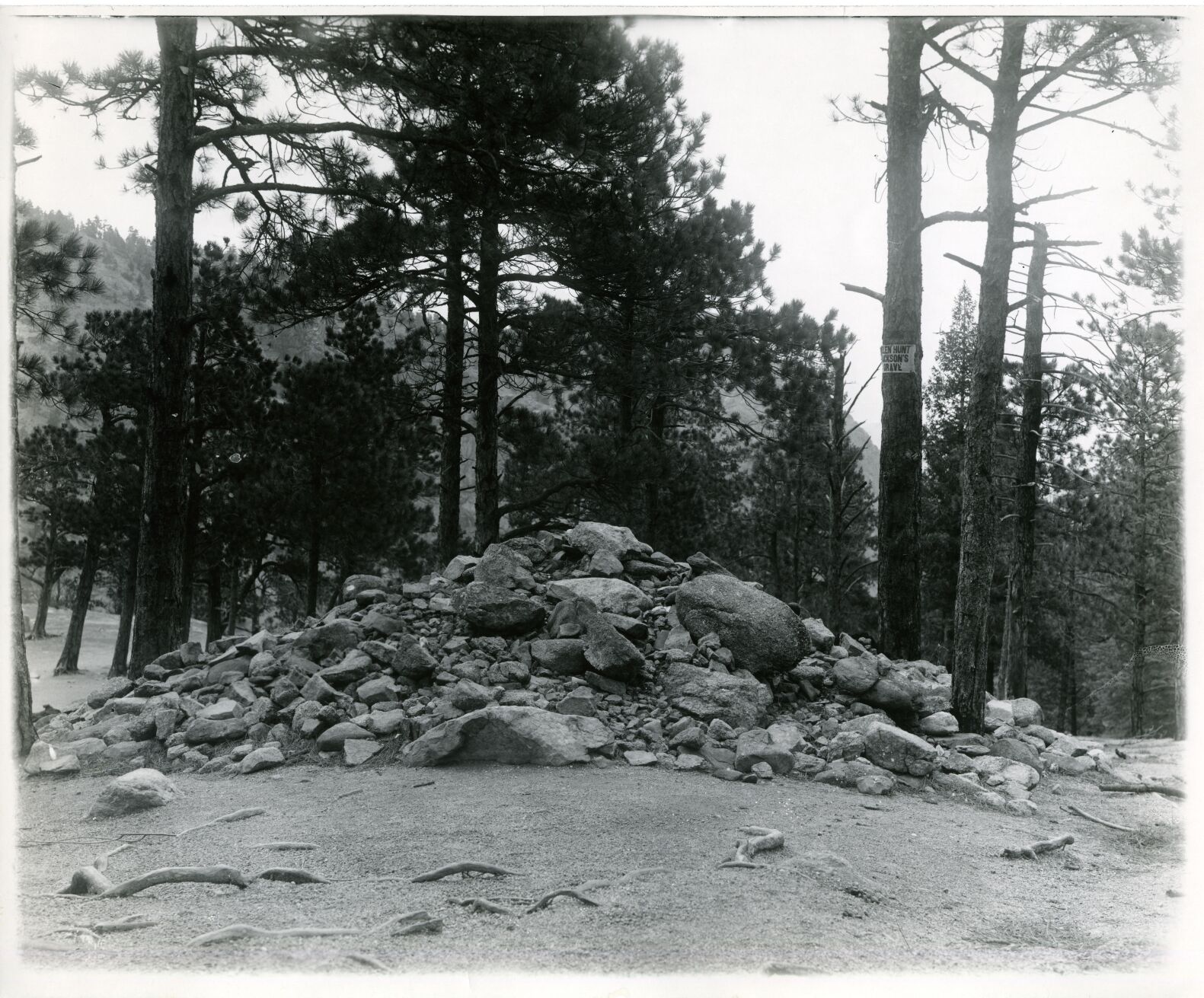 Upon her death in 1885, the writer Helen Hunt Jackson wished to be buried atop Seven Falls at Inspiration Point. Before her grave was moved to Evergreen Cemetery, it was marked by piles of stone. Photo from Gusdorf/Weimer Family Collection