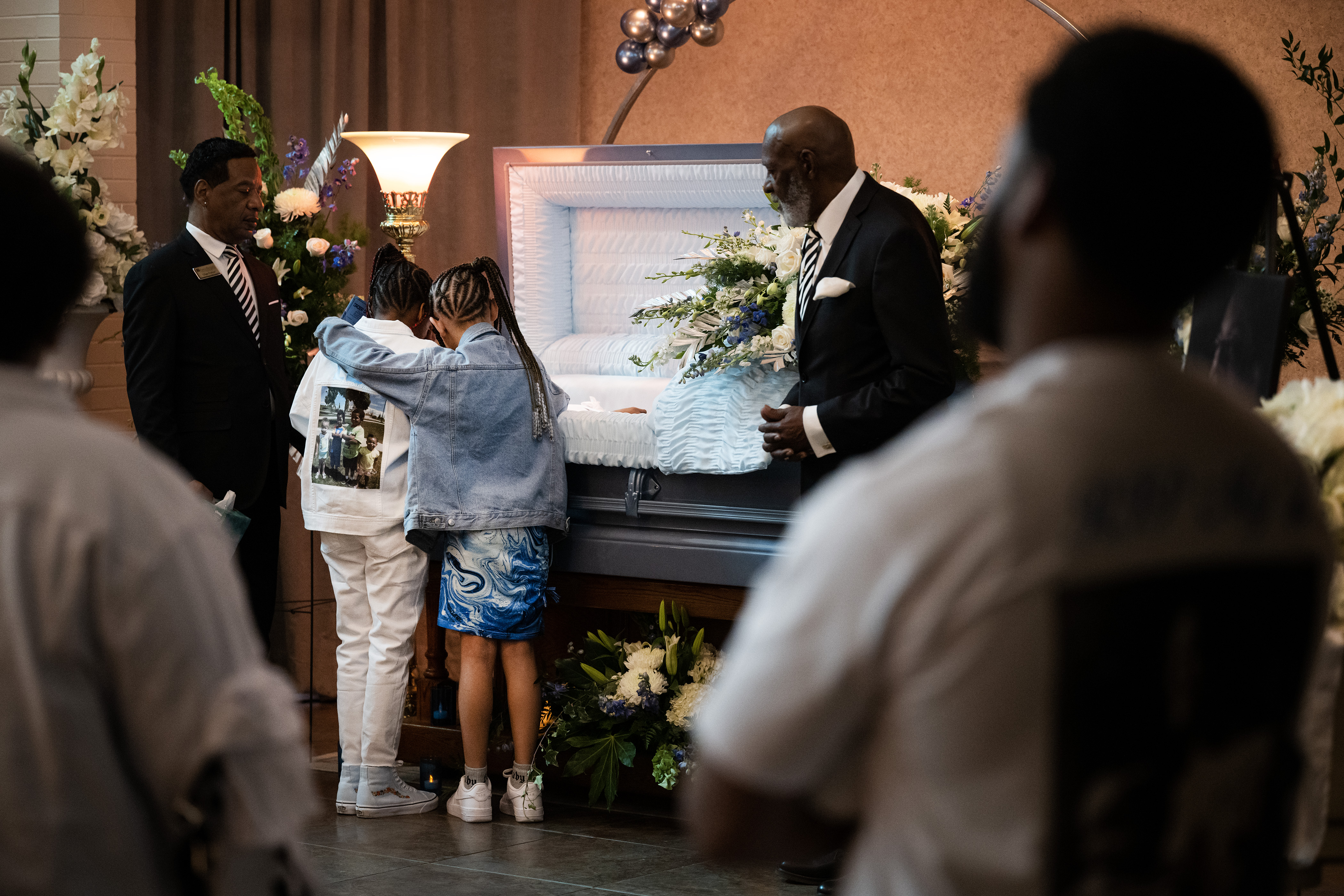 Elias Alexander Armstrong’s sister, Sarah Armstrong, 10, is comforted by Aly’ja Levy, 10, as they look over Armstrong’s casket during the his Celebration of Life ceremony on Friday, Feb. 24, 2023, at Pipkin Braswell Funeral Home in Denver. (TimHursttim.hurst@gazette.comhttps://secure.gravatar.com/avatar/aca82bd62b4ee425c598527cd6faa1b1?d=mm&r=g)