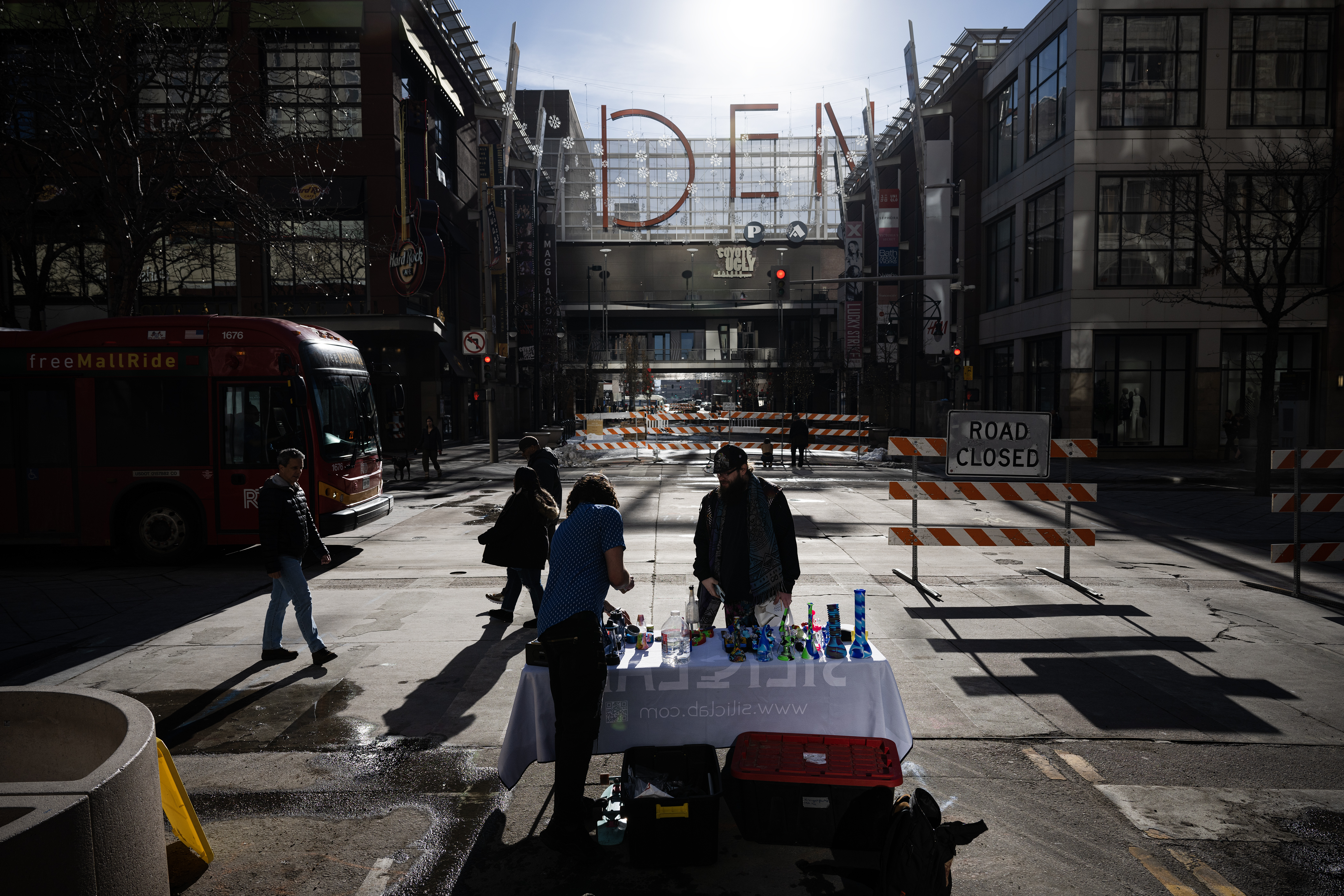 An independent contractor who requested to remain anonymous talks with a pedestrian on 16th Street Mall on Friday, Feb. 17, 2023, in Denver, Colo. (Timothy Hurst/The Denver Gazette) (TimHursttim.hurst@gazette.comhttps://secure.gravatar.com/avatar/aca82bd62b4ee425c598527cd6faa1b1?d=mm&r=g)