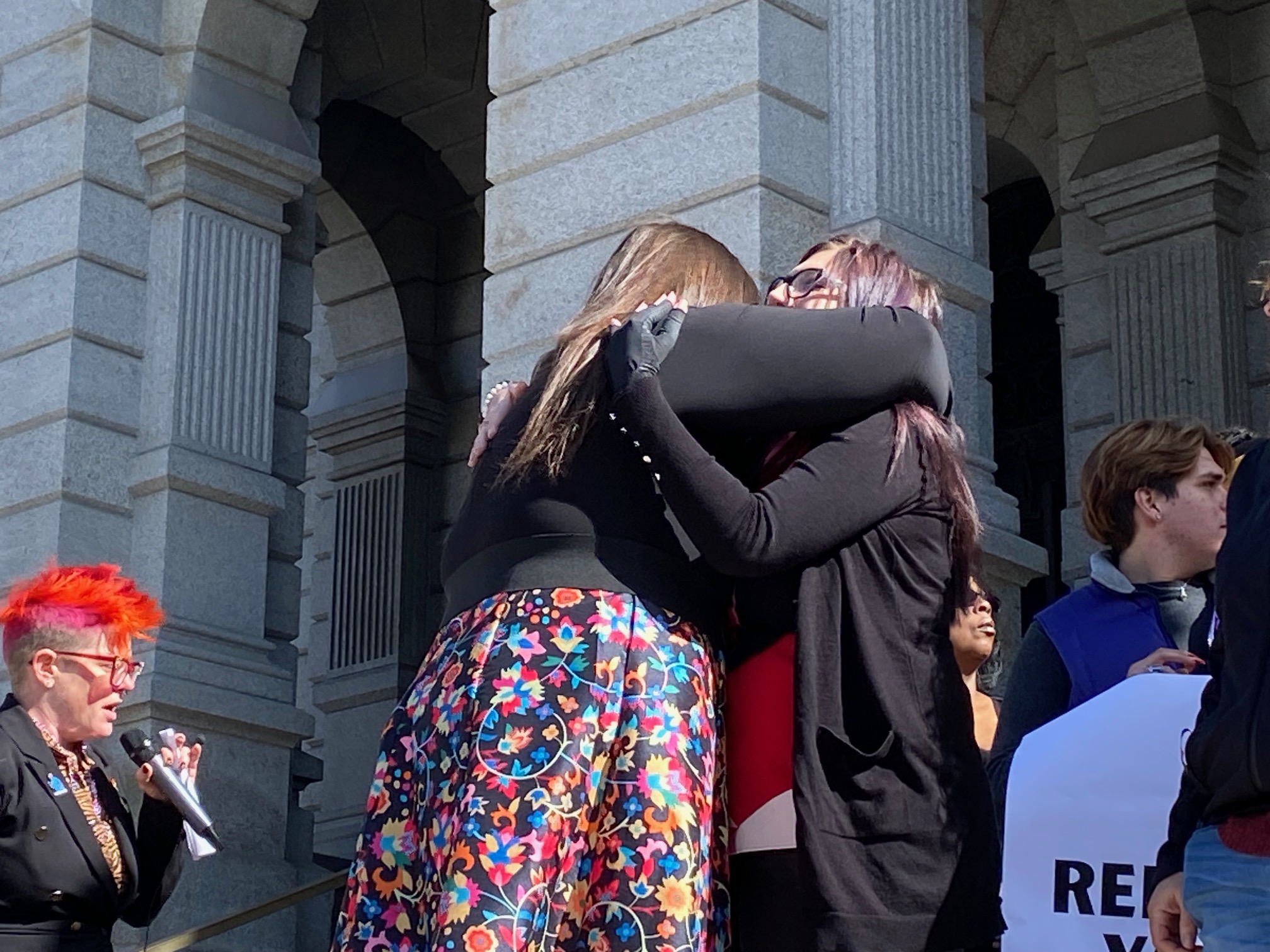 A friend of Sol Tribe victim Alicia Cardenas hugs Club Q victim Ashtin Gamblin after speaking at a press conference held in front of Colorado's state capitol building Tuesday. (CarolMcKinleyDenver Enterprise Reportercarol.mckinley@gazette.comhttps://denvergazette.com/content/tncms/avatars/5/c3/a0f/5c3a0fbe-1007-11ec-9e18-b7f42cfa4b0f.9565a0ce58866e86bcf18260621c2a46.png)