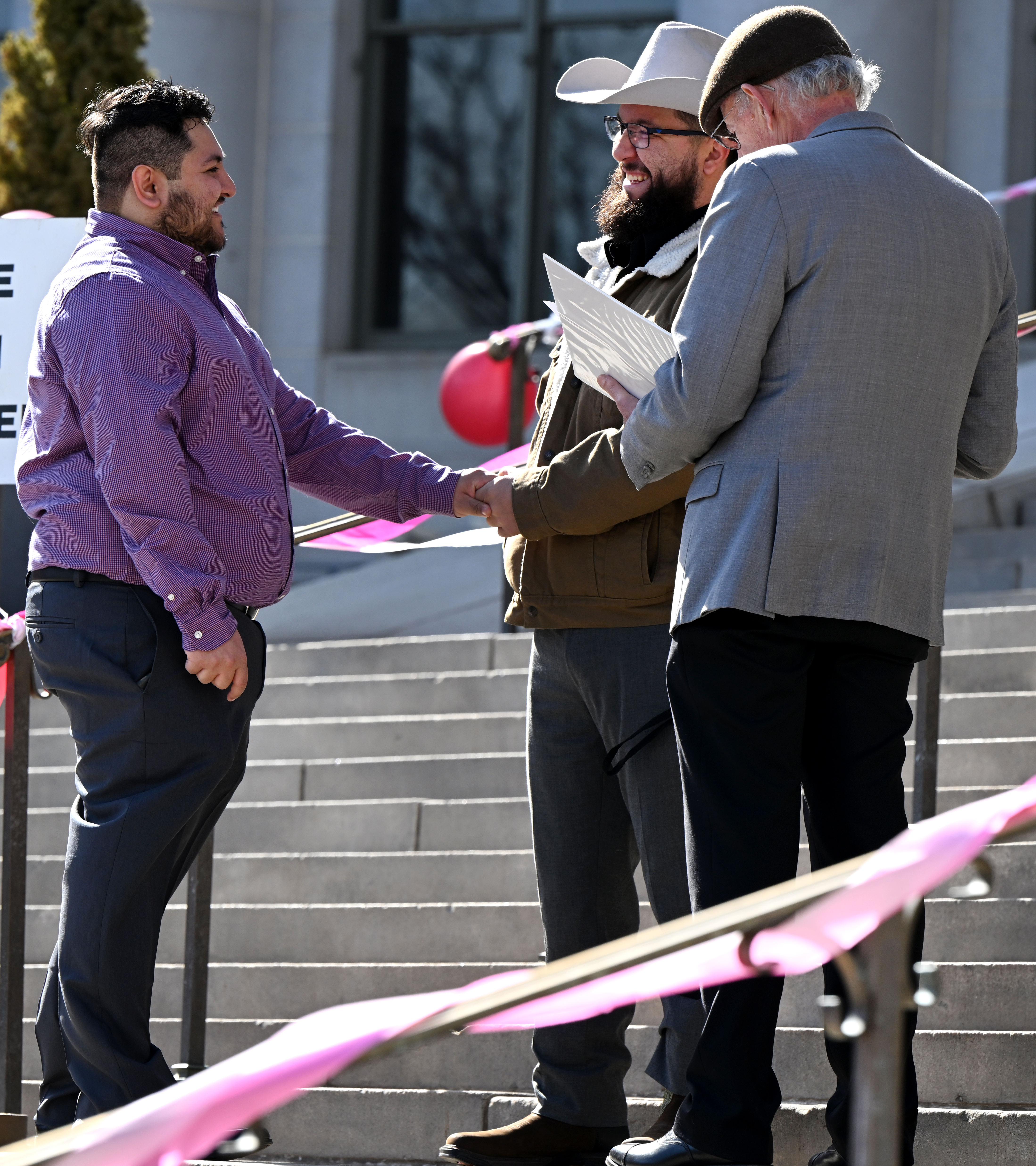 Adrian Villa, left, and Sergio Chavez exchange their vows Tuesday, Feb. 14, 2023, on the front steps of the Denver City and County Building as City Councilman Paul Kashmann officiates their wedding during the Denver Marriage Marathon on Valentine's Day. Ten couples were married during the event. This year was the first year since 2019 it was held because of the pandemic. (The Gazette, Christian Murdock) (ChristianMurdockchristian.murdock@gazette.comhttps://secure.gravatar.com/avatar/7b418fa9a684d03a433f79e3e5065029?d=mm&r=g)