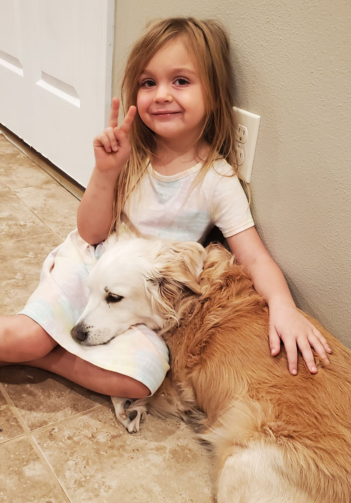 Sophia Berry with her mother's dog, Duke, during a visit to Missouri. ( family photo)