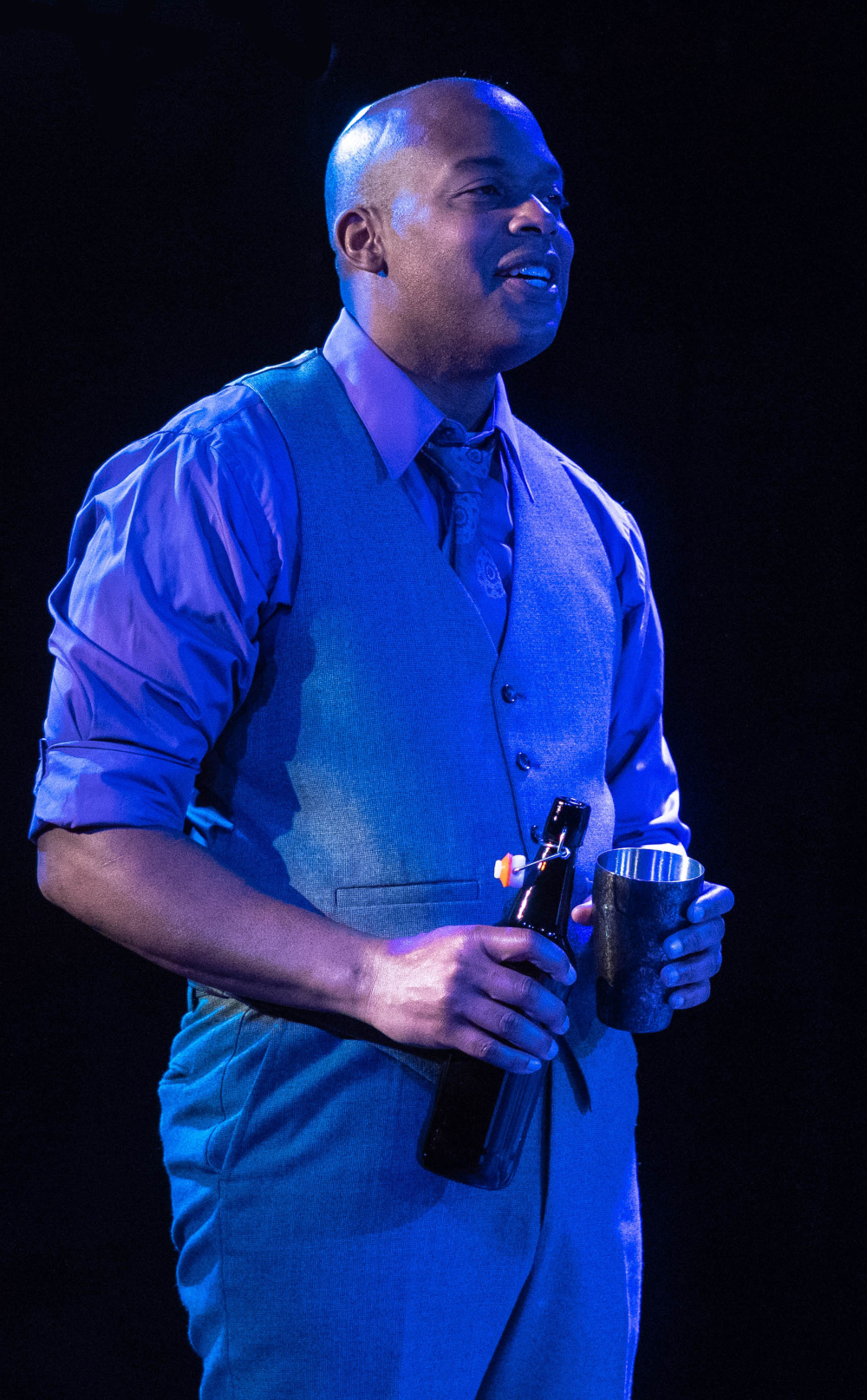 Cajardo Lindsey plays a guilt-ridden man intent on drinking himself to death. (BRIAN MILLER/CHERRY CREEK THEATRE)