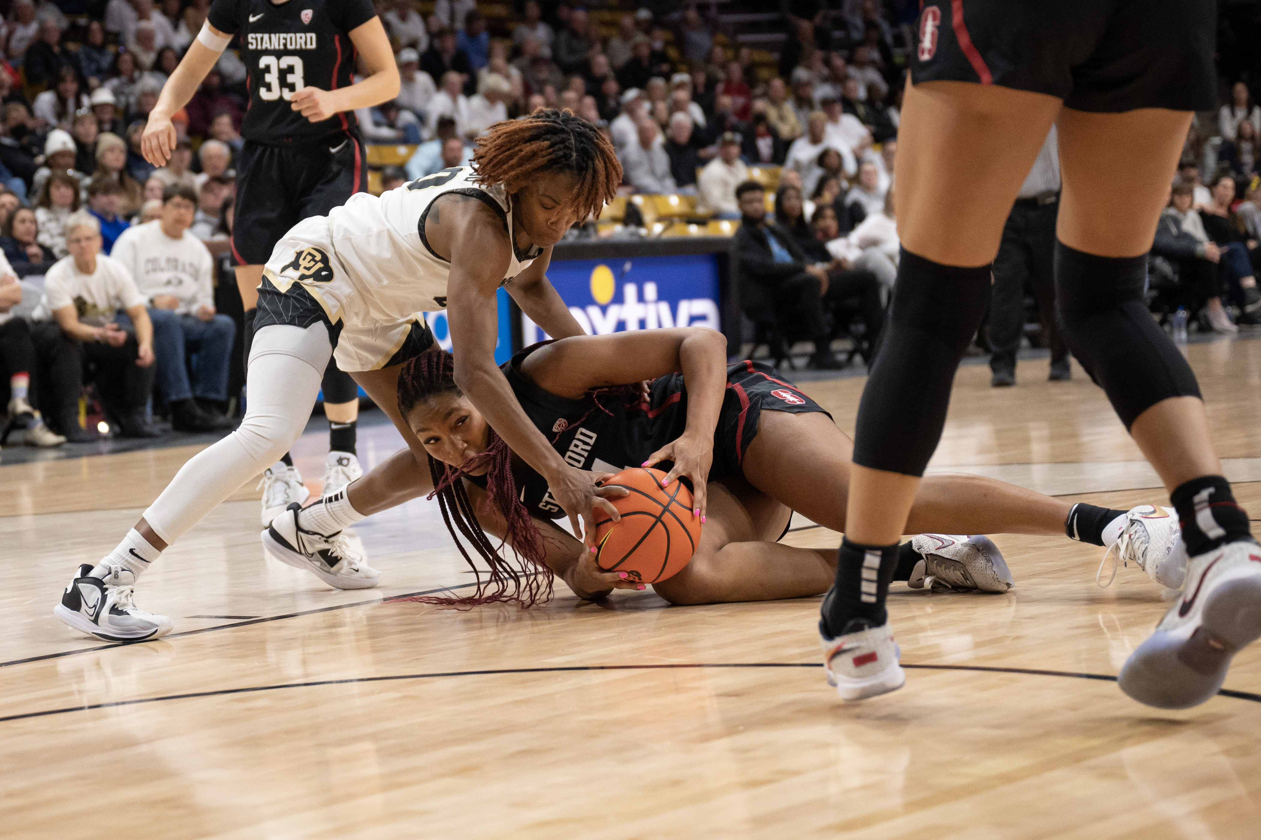 University of Colorado Boulder senior guard Jaylyn Sherrod (00) and Stanford University sophomore forward Kiki Iriafen (44) jostle for a loose ball during a game at the CU Events Center on Thursday, Feb. 23, 2023, in Boulder, Colo. (Timothy Hurst/The Denver Gazette) (TimHursttim.hurst@gazette.comhttps://secure.gravatar.com/avatar/aca82bd62b4ee425c598527cd6faa1b1?d=mm&r=g)