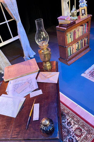 The set of Clover & Bee Productions' 'The Belle of Amherst' is antiquer Gini Mennenga's entree into live local theater as a Properties Designer. (John Moore, The Denver Gazette)