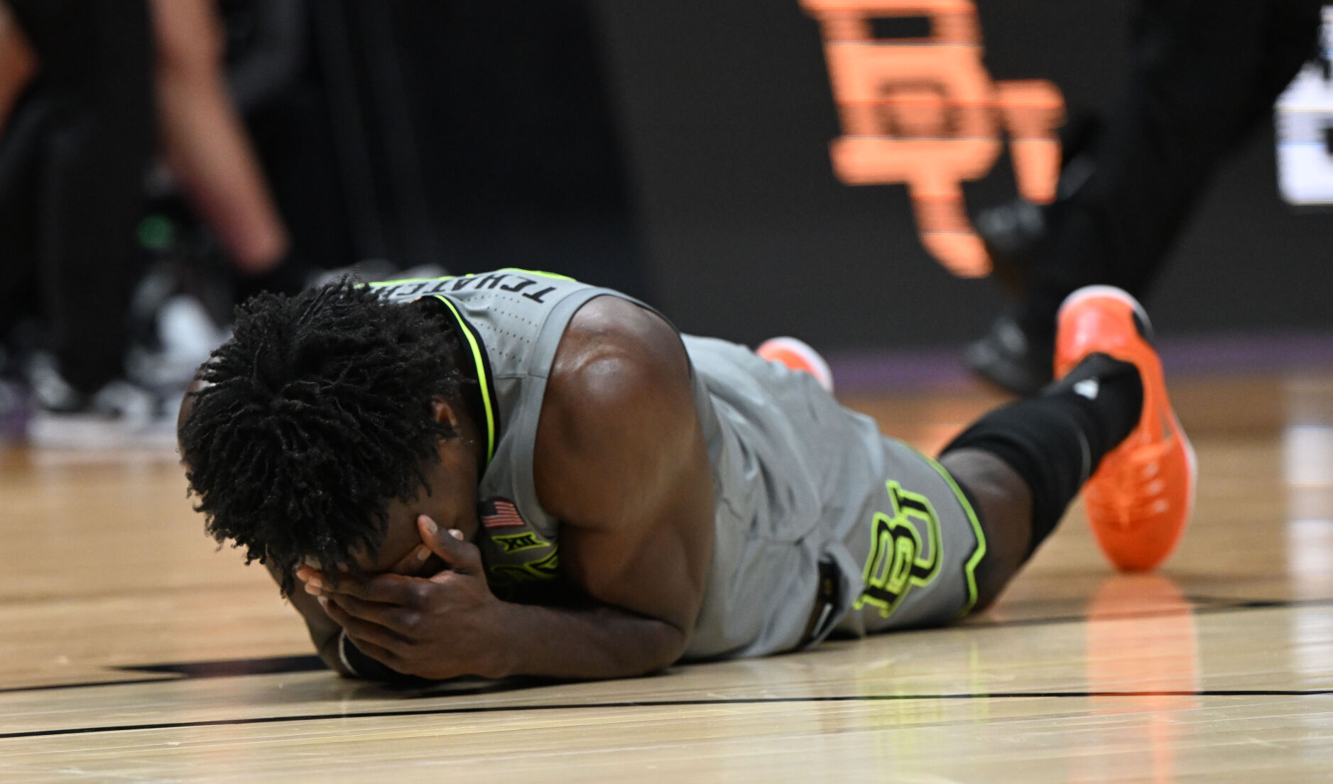 Baylor Bears forward Jonathan Tchamwa Tchatchoua (23) falls to the floor after an injury against the UC Santa Barbara Gauchos during the second half of a first round of the Men’s NCAA Tournament Friday, March 17, 2023, at Ball Arena in Denver. Baylor defeated UC Santa Barbara 74-56. (The Gazette, Christian Murdock) (Christian Murdock/The Gazette)