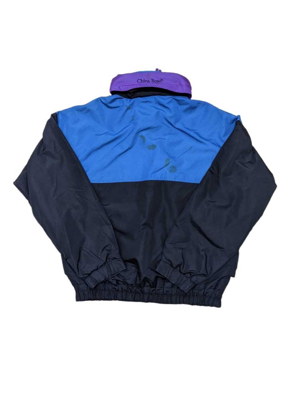 Columbia sportwear jackets made in the 1990s are common retro or vintage outerwear among skiers and riders, like this China Bowl jacket. (Screengrab, Ebay)