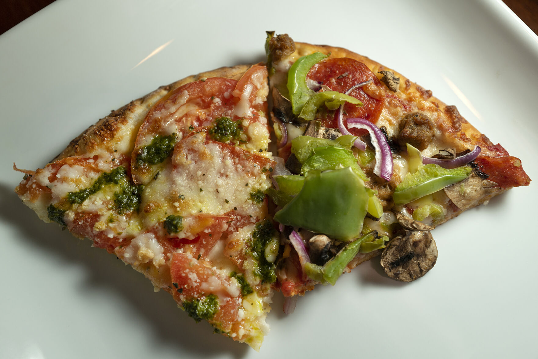 Roadrunner Pizza (Located at: 3113 N. Hancock Ave.) “Roadrunner Combo and Di Pizza Margherita” Wednesday March 15, 2023. Photo by Jeff Kearney.