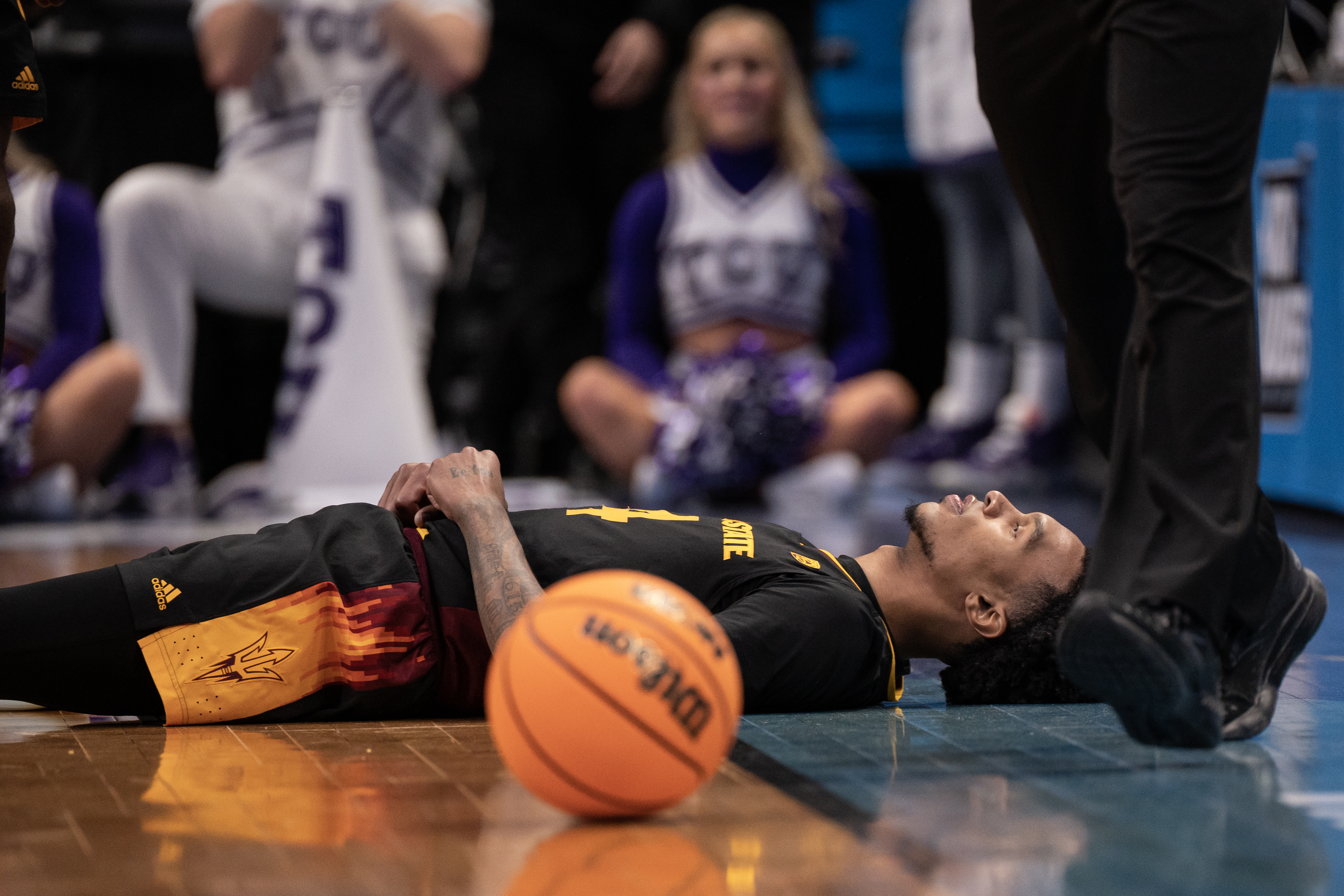 Arizona State Sun Devils guard Desmond Cambridge Jr. (4) lays on the court after losing the ball during a first-round college basketball game against the TCU Horned Frogs in the NCAA Tournament on Friday, March 17, 2023, at Ball Arena in Denver, Colo. (Timothy Hurst/Denver Gazette) (TimHursttim.hurst@gazette.comhttps://secure.gravatar.com/avatar/aca82bd62b4ee425c598527cd6faa1b1?d=mm&r=g)