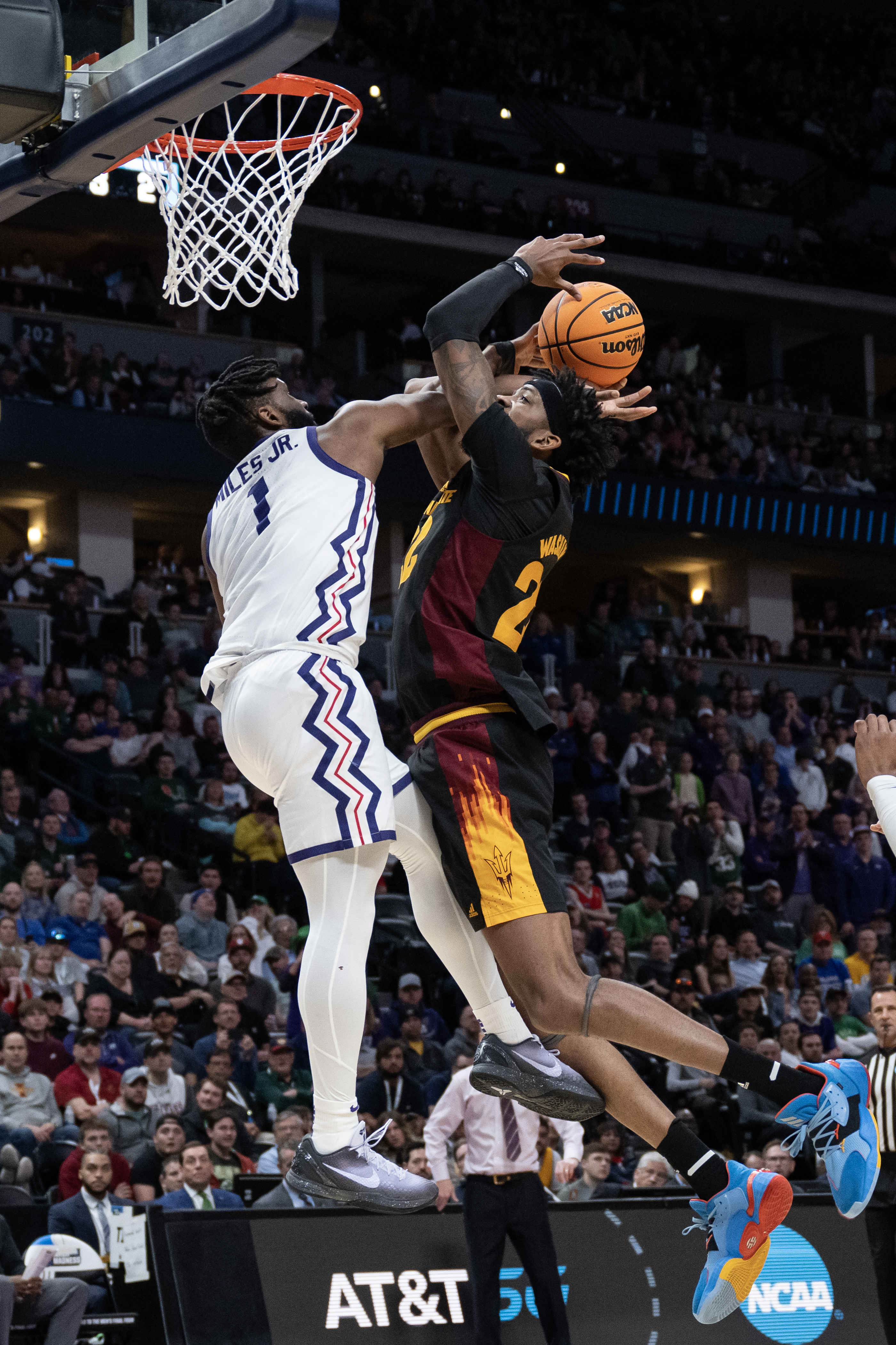 TCU Horned Frogs guard Mike Miles Jr. (1) blocks a shot by Arizona State Sun Devils forward Warren Washington (22) during a first-round college basketball game in the NCAA Tournament on Friday, March 17, 2023, at Ball Arena in Denver, Colo. (Timothy Hurst/Denver Gazette) (TimHursttim.hurst@gazette.comhttps://secure.gravatar.com/avatar/aca82bd62b4ee425c598527cd6faa1b1?d=mm&r=g)
