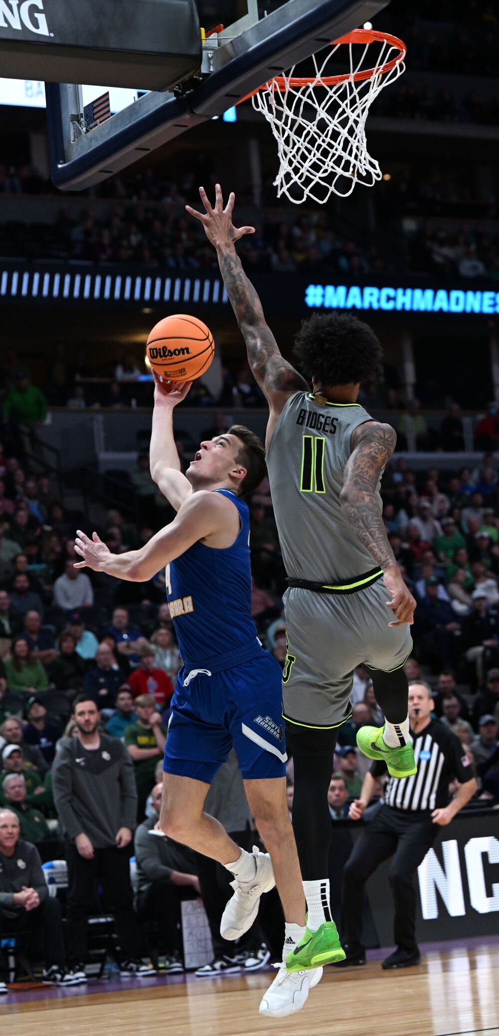 UC Santa Barbara Gauchos guard Cole Anderson (4) goes up for a shot against Baylor Bears forward Jalen Bridges (11) during the first half of a first round of the Men’s NCAA Tournament Friday, March 17, 2023, at Ball Arena in Denver. (The Gazette, Christian Murdock) (Christian Murdock/The Gazette)