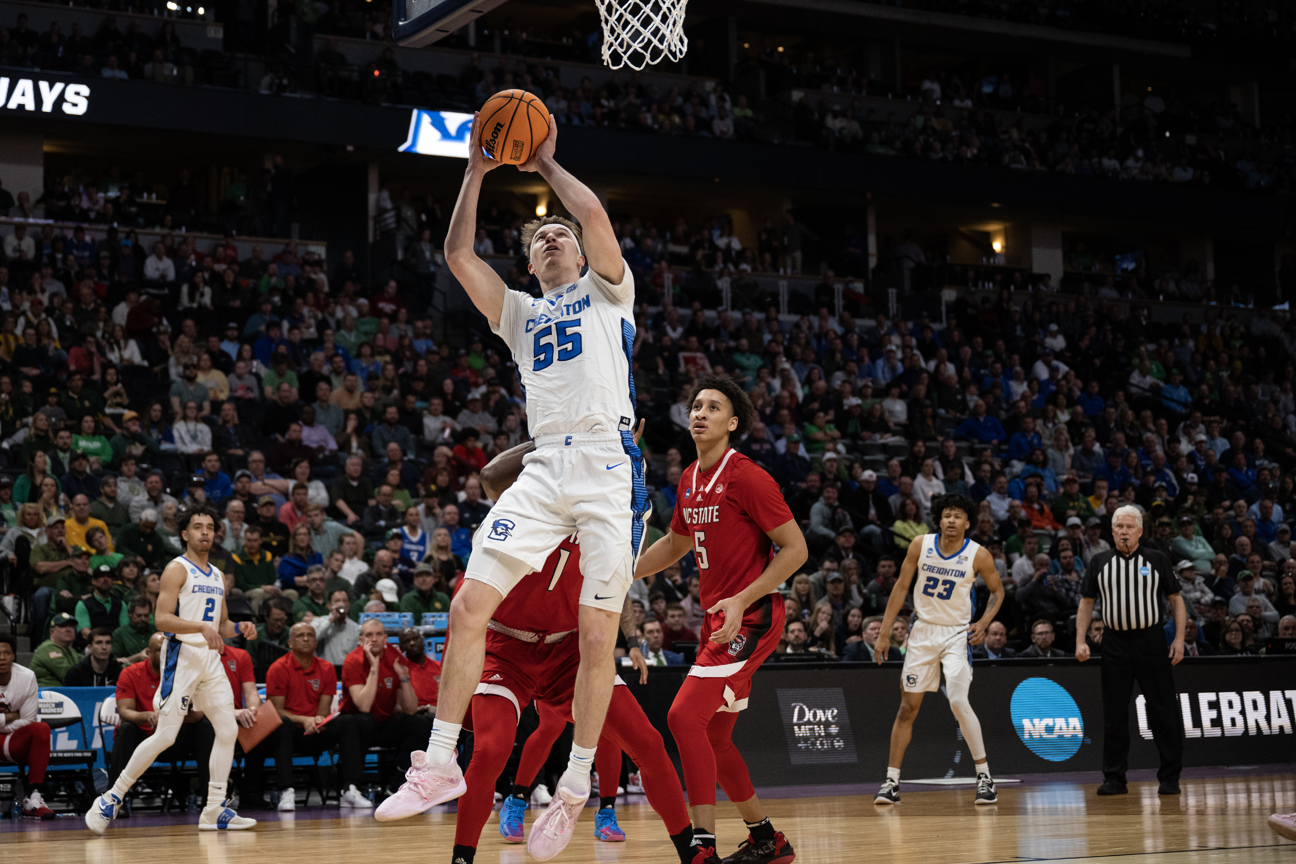 Creighton senior guard Baylor Scheierman (55) gets past North Carolina State for a layup during a first-round college basketball game in the NCAA Tournament on Friday, March 17, 2023, at Ball Arena in Denver, Colo. (Timothy Hurst/Denver Gazette) (Timothy Hurst/Denver Gazette)