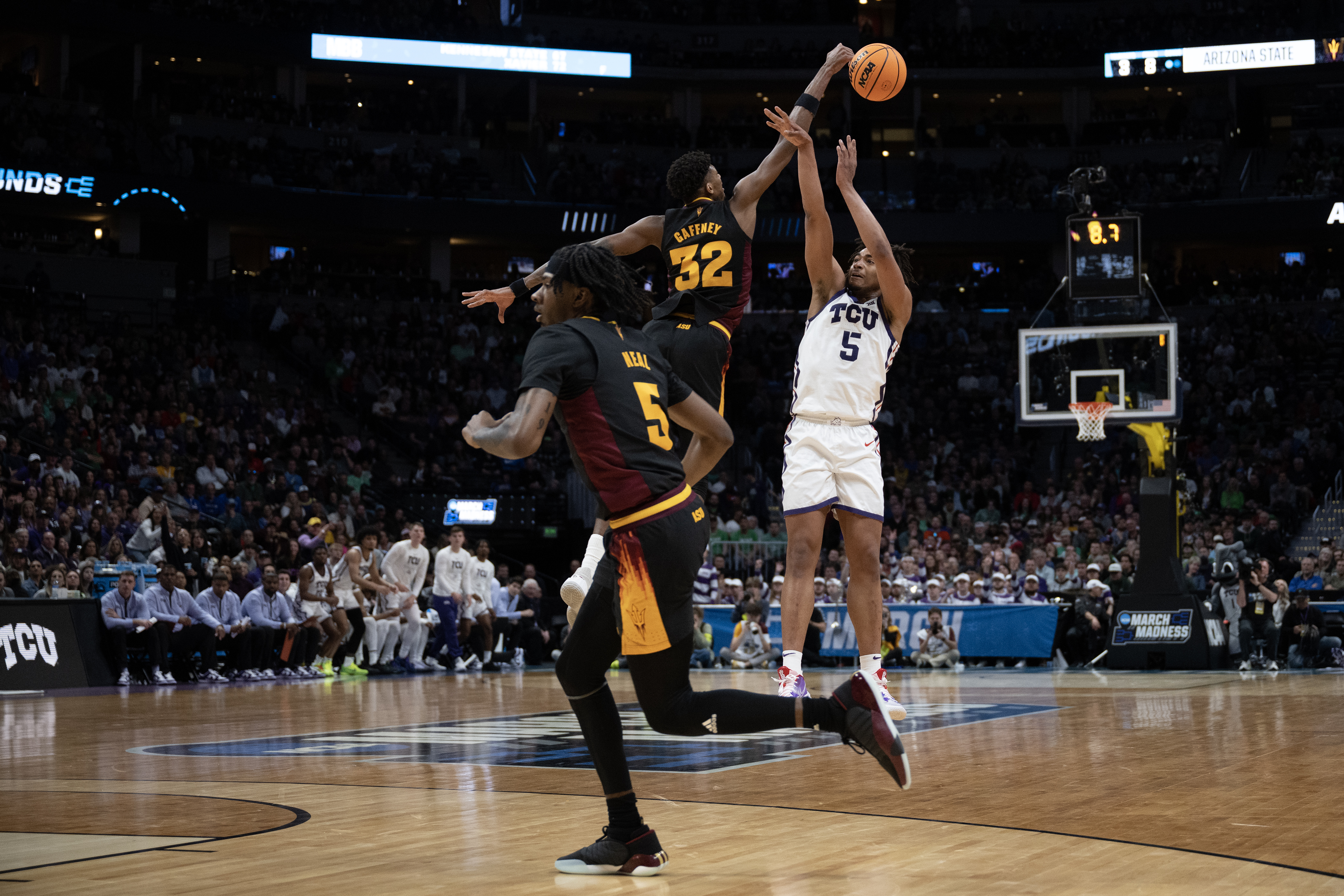 TCU Horned Frogs forward Chuck O'Bannon Jr. (5) has a three pointer blocked by Arizona State Sun Devils forward Alonzo Gaffney (32) during a first-round college basketball game in the NCAA Tournament on Friday, March 17, 2023, at Ball Arena in Denver, Colo. (Timothy Hurst/Denver Gazette) (TimHursttim.hurst@gazette.comhttps://secure.gravatar.com/avatar/aca82bd62b4ee425c598527cd6faa1b1?d=mm&r=g)