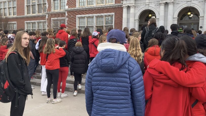 Students gathered in front of East High School to have a moment of silence for slain 16 year-old Luis Garcia. Soccer teammates led the moment for 11 seconds, representative of Garcia's jersey number 11. (Carol McKinley/Denver Gazette)