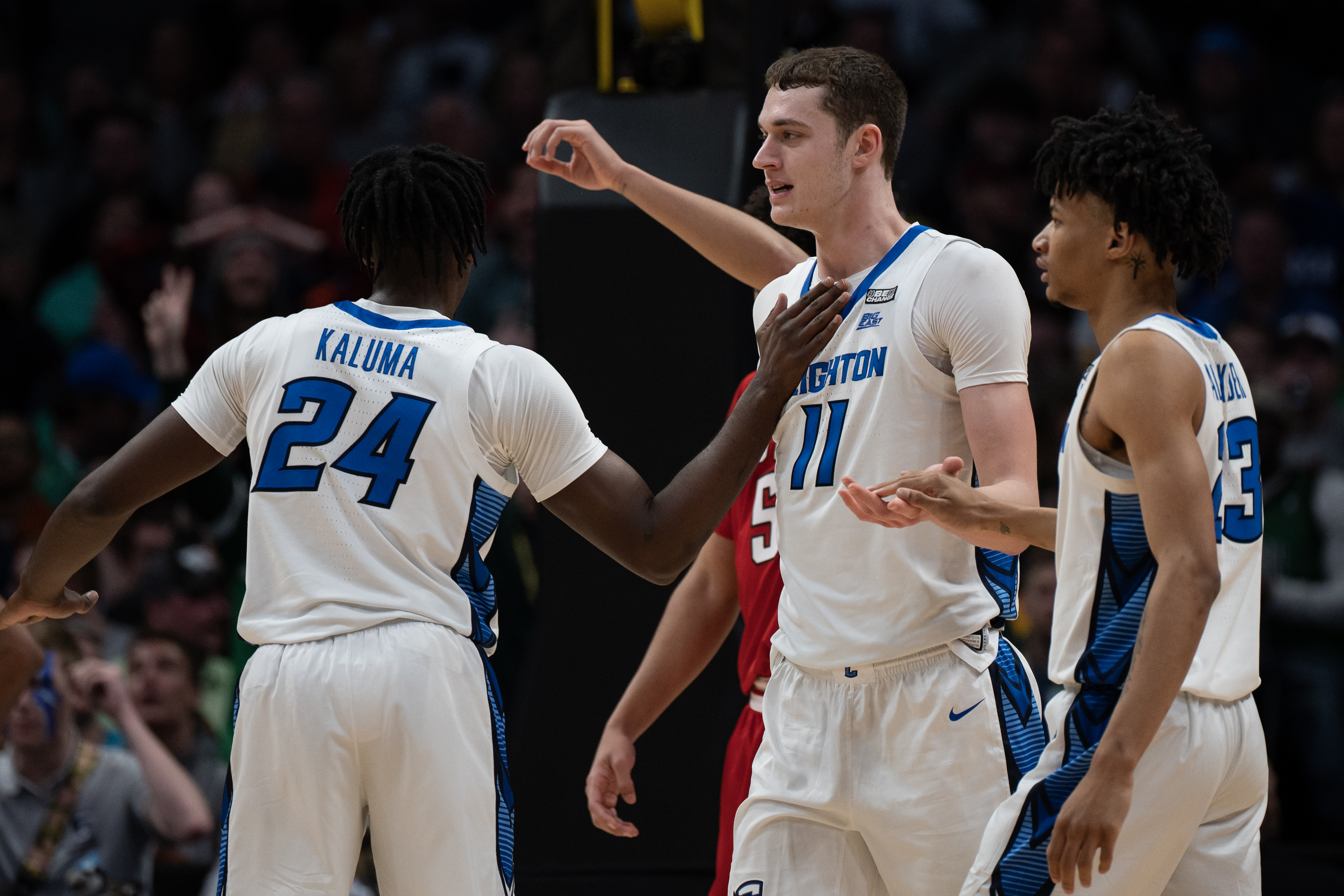 Creighton Bluejays center Ryan Kalkbrenner (11) is greeted by teammates after a dunk during a first-round college basketball game against South Carolina State in the NCAA Tournament on Friday, March 17, 2023, at Ball Arena in Denver, Colo. (Timothy Hurst/Denver Gazette) (TimHursttim.hurst@gazette.comhttps://secure.gravatar.com/avatar/aca82bd62b4ee425c598527cd6faa1b1?d=mm&r=g)