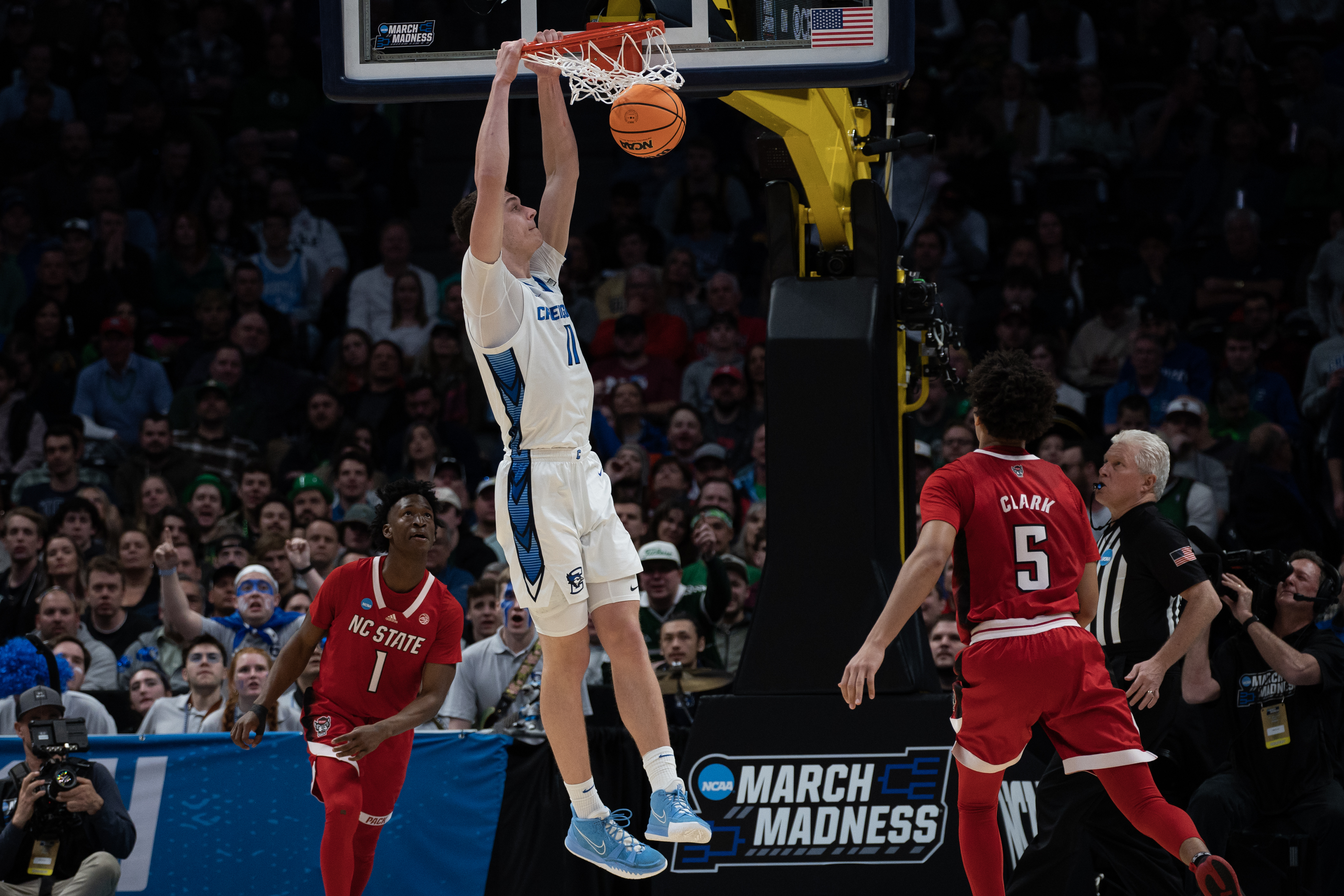 Creighton Bluejays center Ryan Kalkbrenner (11) dunks during a first-round college basketball game against North Carolina State in the NCAA Tournament on Friday, March 17, 2023, at Ball Arena in Denver, Colo. (Timothy Hurst/Denver Gazette) (TimHursttim.hurst@gazette.comhttps://secure.gravatar.com/avatar/aca82bd62b4ee425c598527cd6faa1b1?d=mm&r=g)
