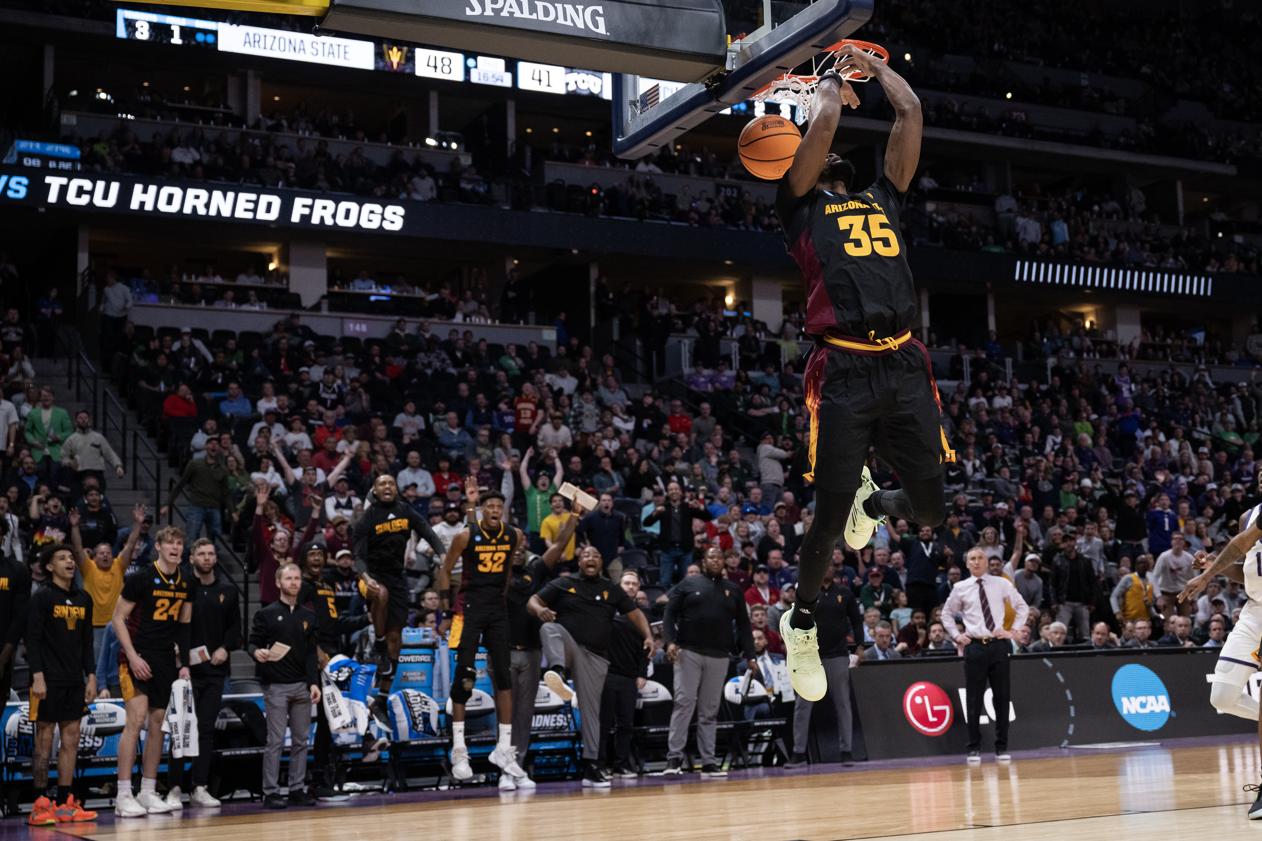 Arizona State Sun Devils guard Devan Cambridge (35) dunks during a first-round college basketball game against the TCU Horned Frogs in the NCAA Tournament on Friday, March 17, 2023, at Ball Arena in Denver, Colo. (Timothy Hurst/Denver Gazette) (TimHursttim.hurst@gazette.comhttps://secure.gravatar.com/avatar/aca82bd62b4ee425c598527cd6faa1b1?d=mm&r=g)