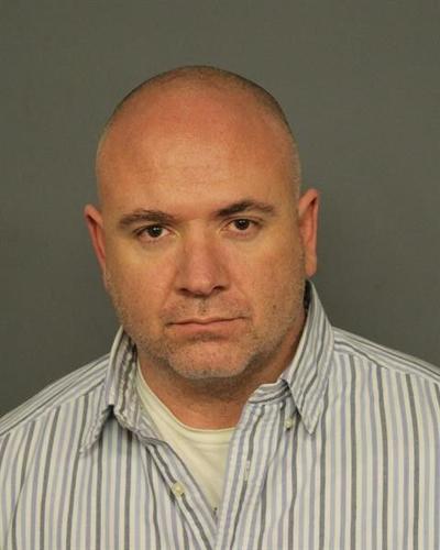Denver Police Department arrests own officer on suspicion of theft