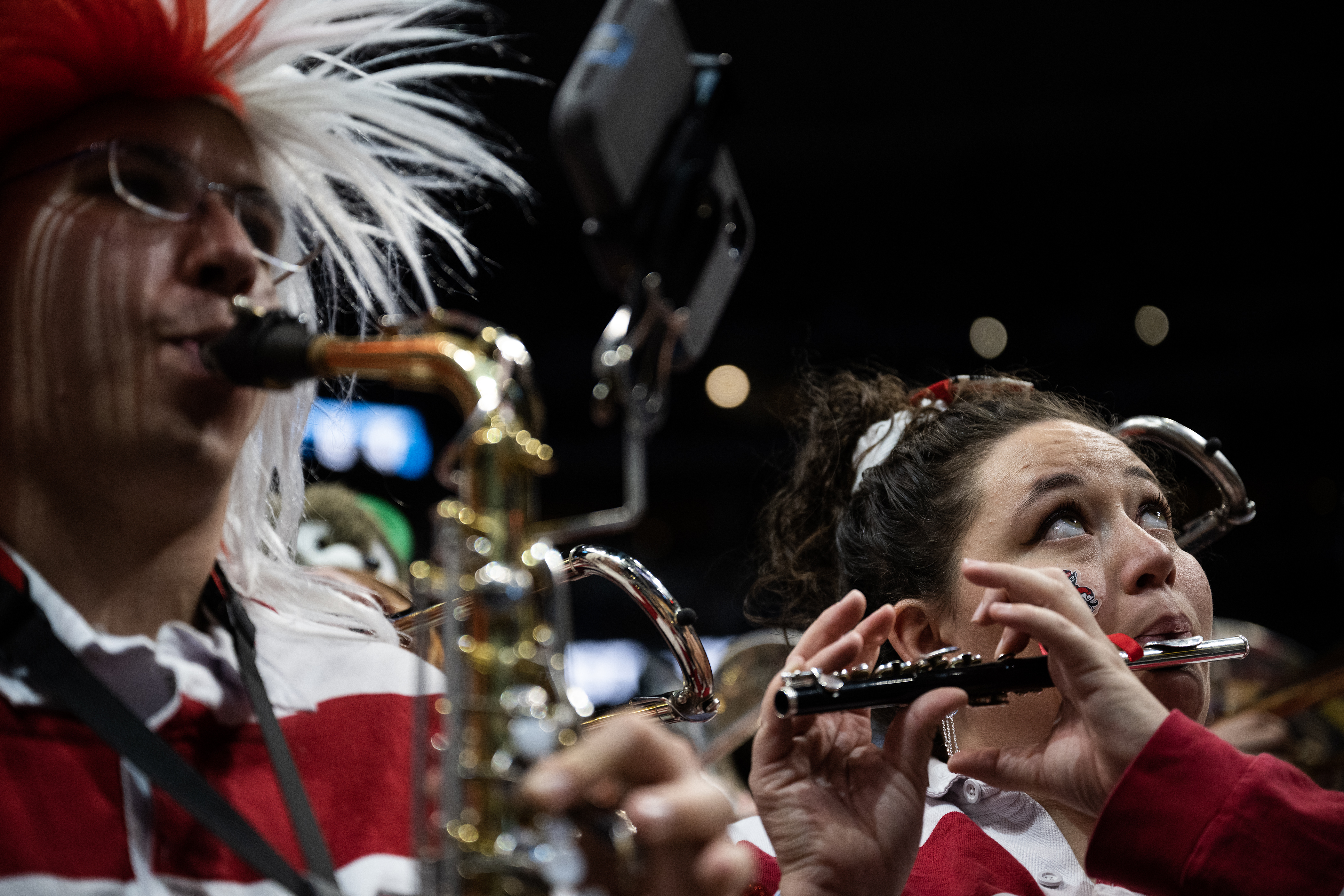 North Carolina State fifth year band member Sarah Sisk looks up while playing at a break during a first-round college basketball game against Creighton in the NCAA Tournament on Friday, March 17, 2023, at Ball Arena in Denver, Colo. (Timothy Hurst/Denver Gazette) (Timothy Hurst/Denver Gazette)