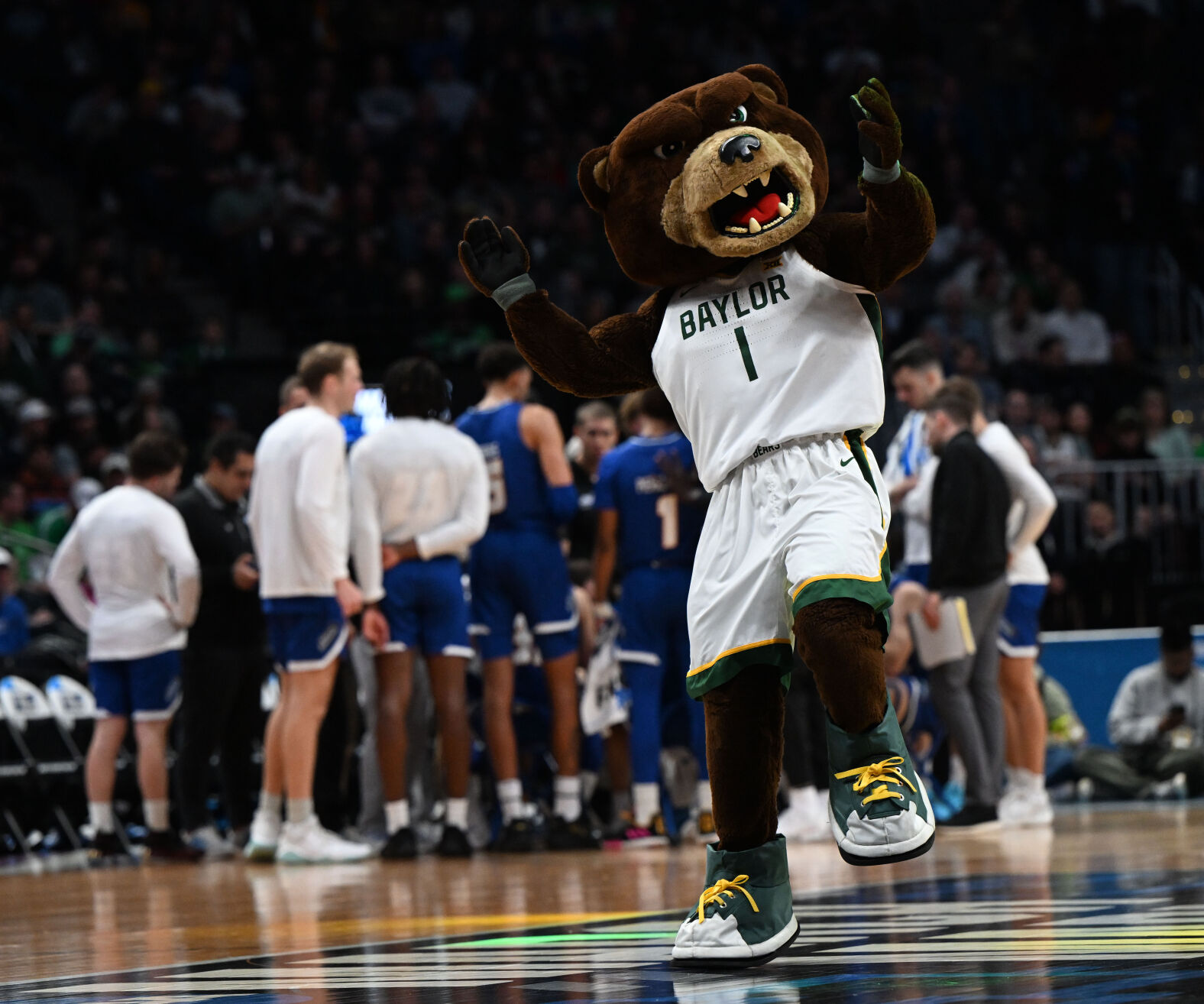 Baylor Bears mascot Bruiser cheers during a timeout in the first half of a first round of the Men’s NCAA Tournament against the UC Santa Barbara Gauchos Friday, March 17, 2023, at Ball Arena in Denver. (The Gazette, Christian Murdock) (Christian Murdock/The Gazette)
