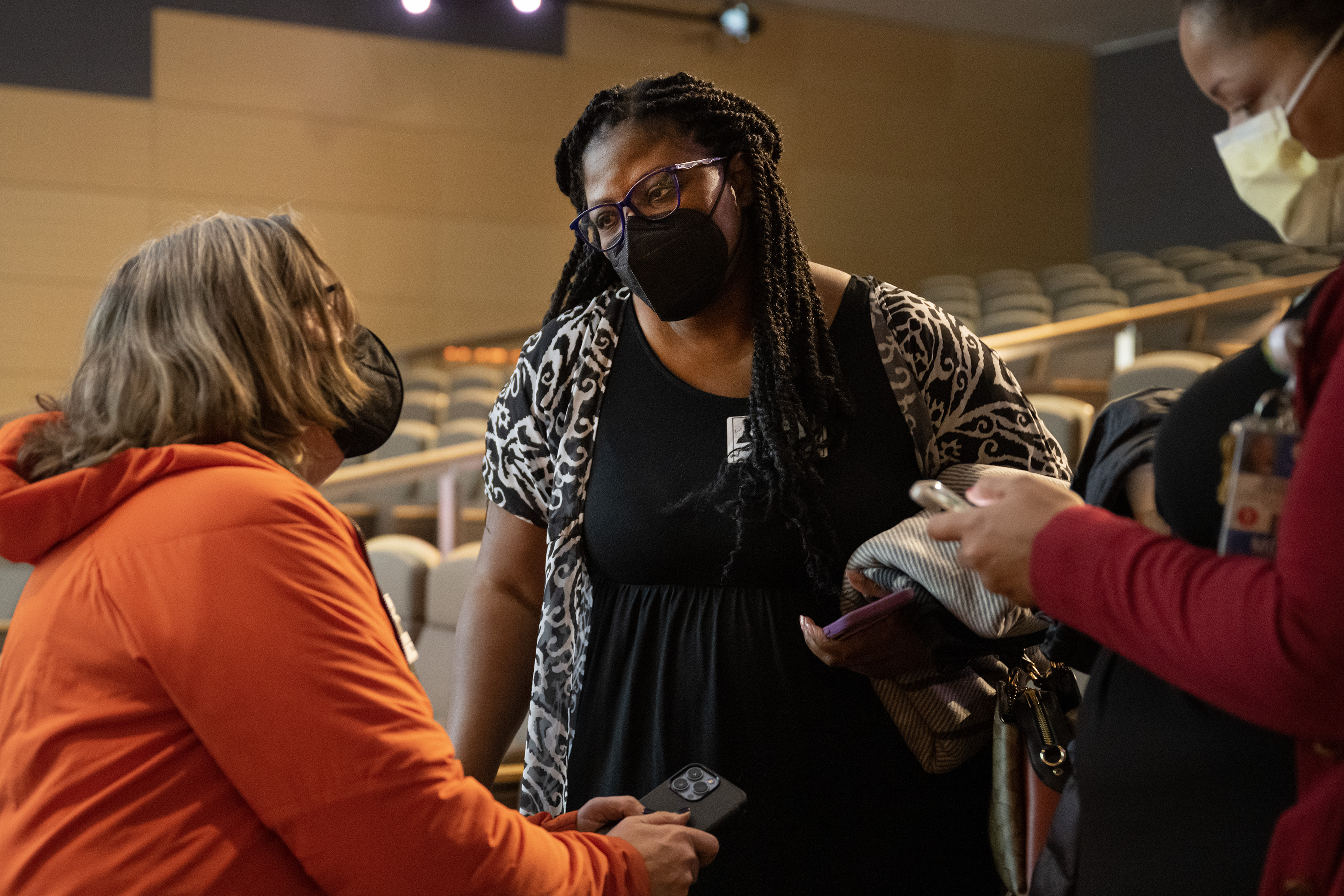 Rasheeda Ouedraogo, a school phycologist with Colorado Society of School Psychologists, center, talks with other audience members after a Bright Spots conversation series about mental health event on Friday, March 3, 2023, at Children's Hospital Colorado in Aurora, Colo. (Timothy Hurst/Denver Gazette) (TimHursttim.hurst@gazette.comhttps://secure.gravatar.com/avatar/aca82bd62b4ee425c598527cd6faa1b1?d=mm&r=g)