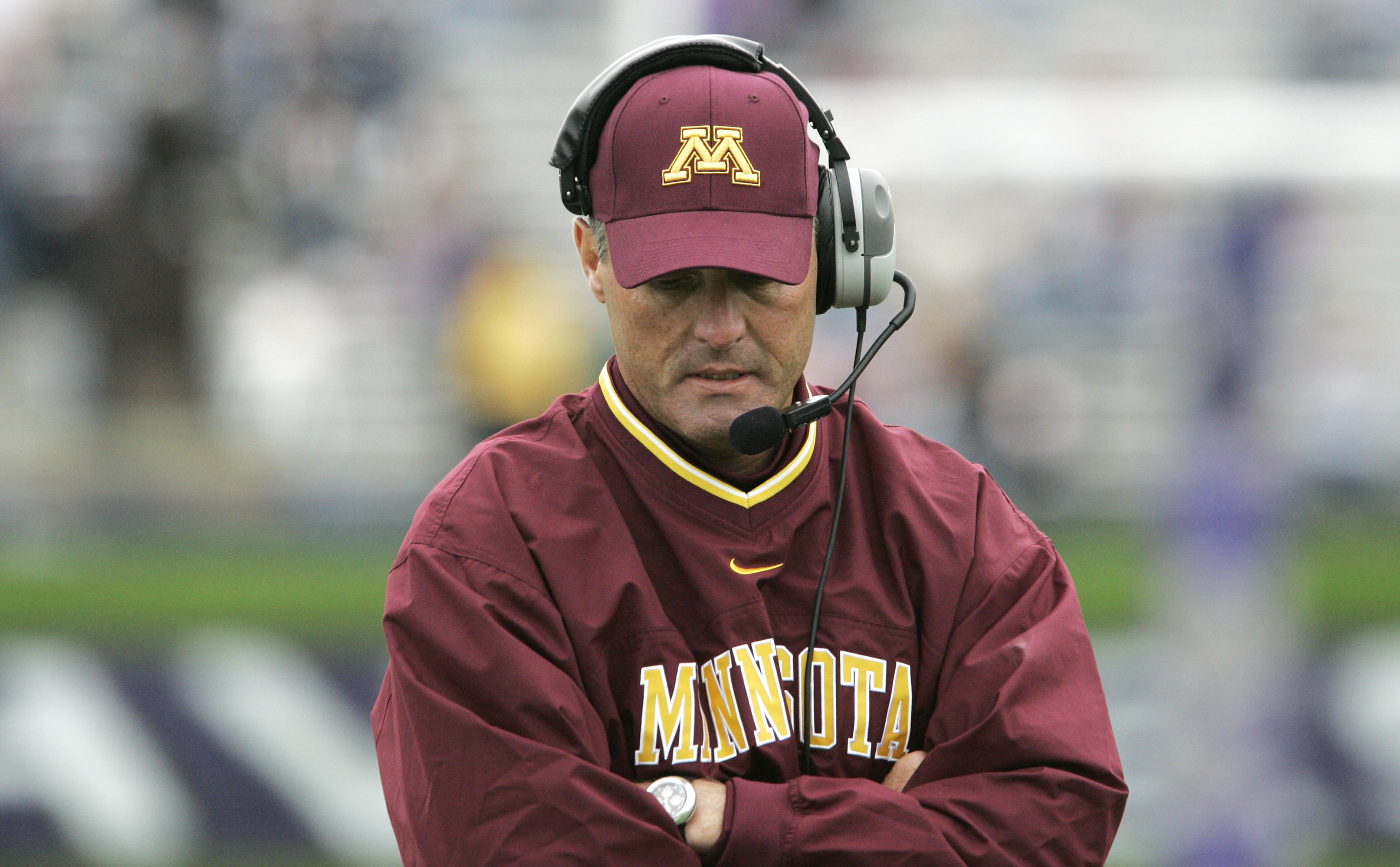 Minnesota head coach Tim Brewster walks the sideline during an NCAA football game against Northwestern Saturday Oct. 13, 2007, in Evanston, Ill. Minnesota was defeated by Northwestern, 49-48, in double overtime. (AP Photo/ (AP Photo/M. Spencer Green) (M. Spencer Green)