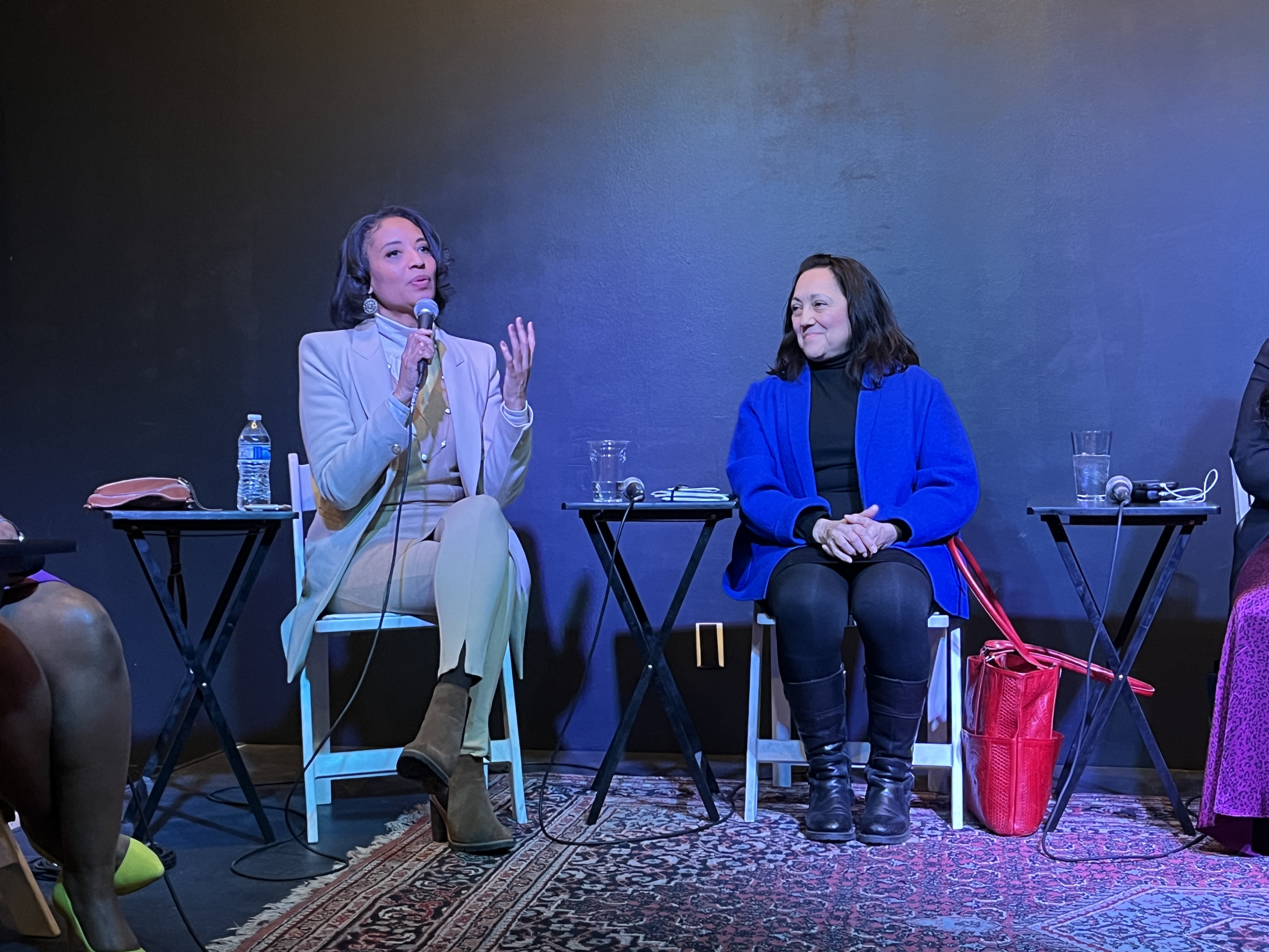 Lisa Calderon gives her opening remarks while Councilwoman Debbie Ortega listens in. (Alex Edwards, The Denver Gazette)