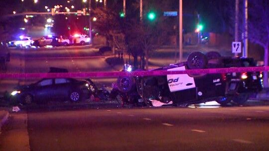 1 killed, Aurora officer injured in rollover crash