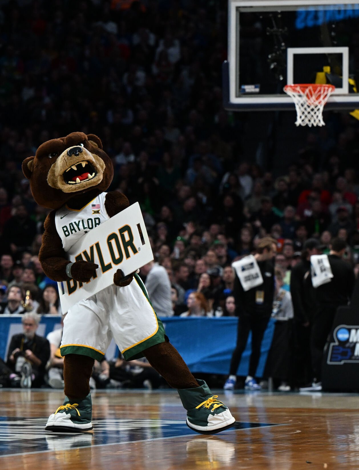 Baylor Bears mascot Bruiser plays a little air guitar during a timeout during the second half of a first round of the Men’s NCAA Tournament Friday, March 17, 2023, against UC Santa Barbara at Ball Arena in Denver. Baylor defeated UC Santa Barbara 74-56. (The Gazette, Christian Murdock) (Christian Murdock/The Gazette)