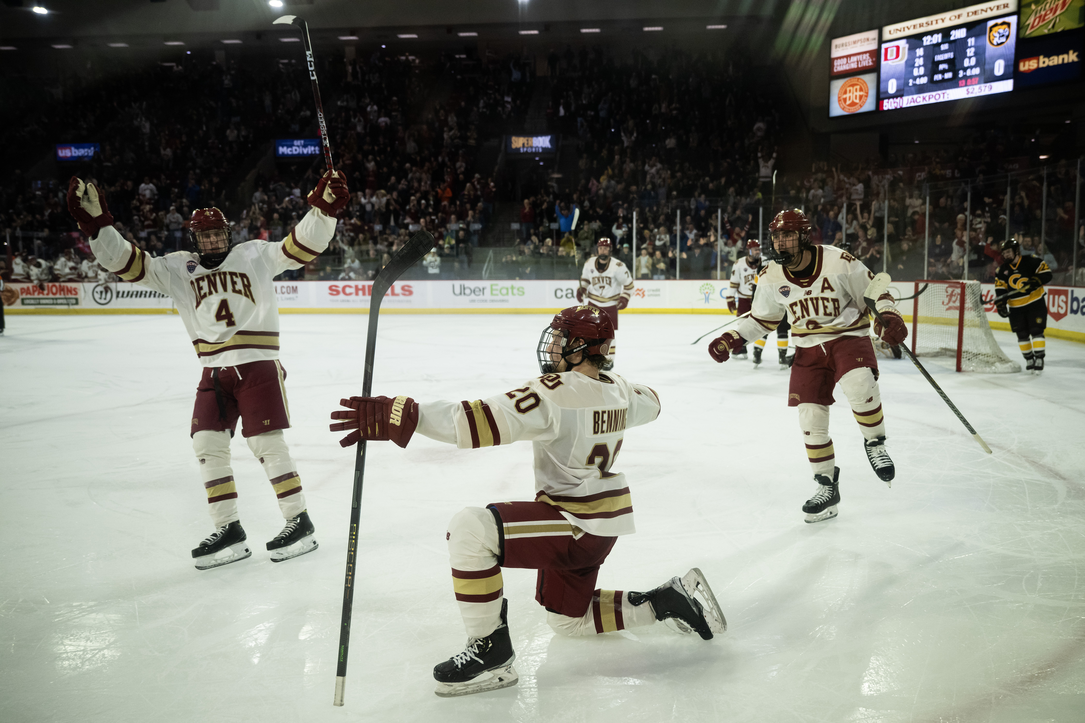 University of Denver junior defenseman Mike Benning (20) celebrates scoring the first goal of the game against Colorado College on Friday, March 3, 2023, at Magness Arena in Denver, Colo. (Timothy Hurst/Denver Gazette) (TimHursttim.hurst@gazette.comhttps://secure.gravatar.com/avatar/aca82bd62b4ee425c598527cd6faa1b1?d=mm&r=g)