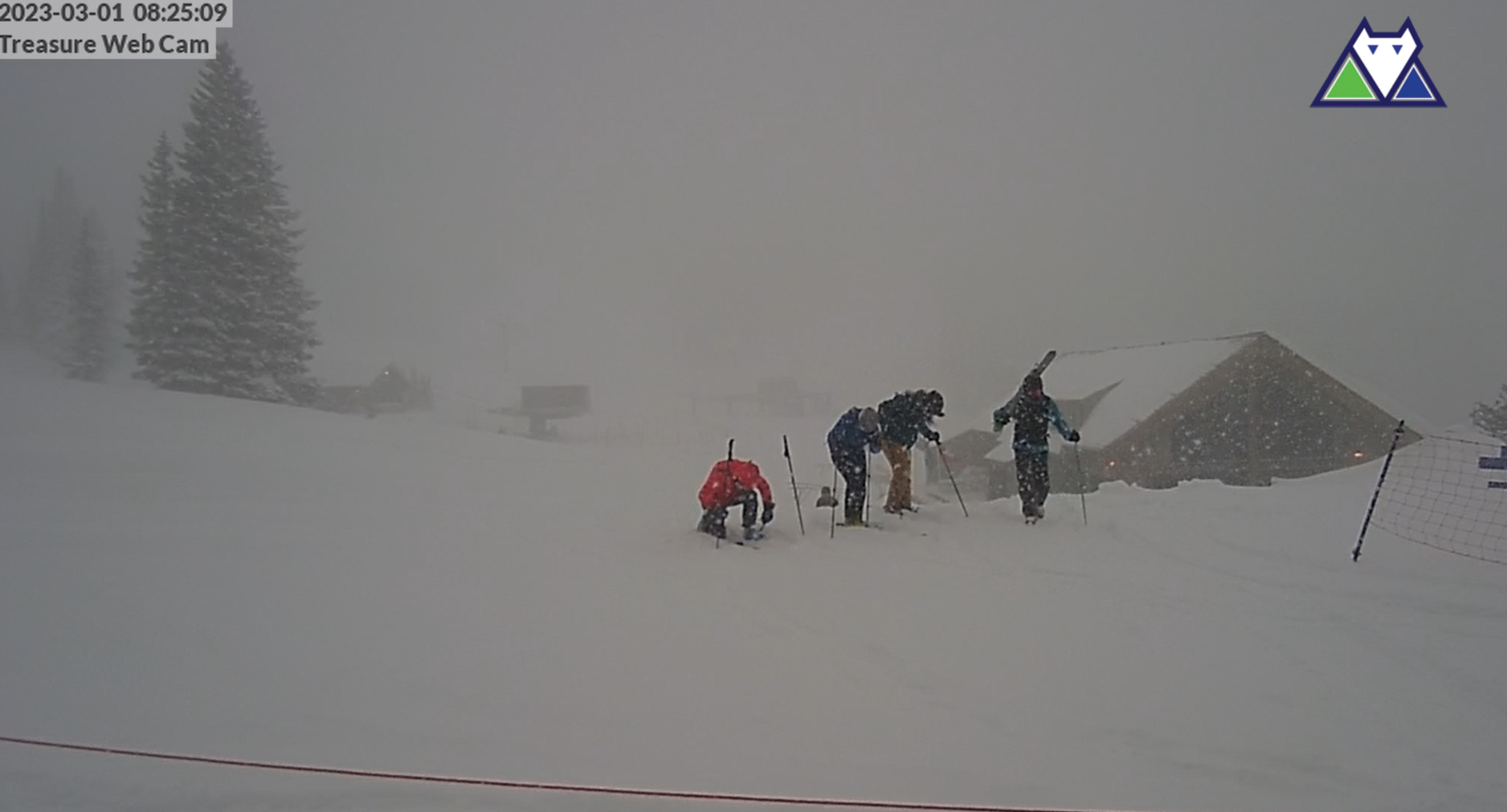 Wolf Creek Ski Area web camera from the base area shows four snow riders putting their skis or snowboards on Wednesday, March 1, 2023 at Wolf Creek Ski Area in Mineral County, Colorado. (Wolf Creek Ski Area, screen grab)
