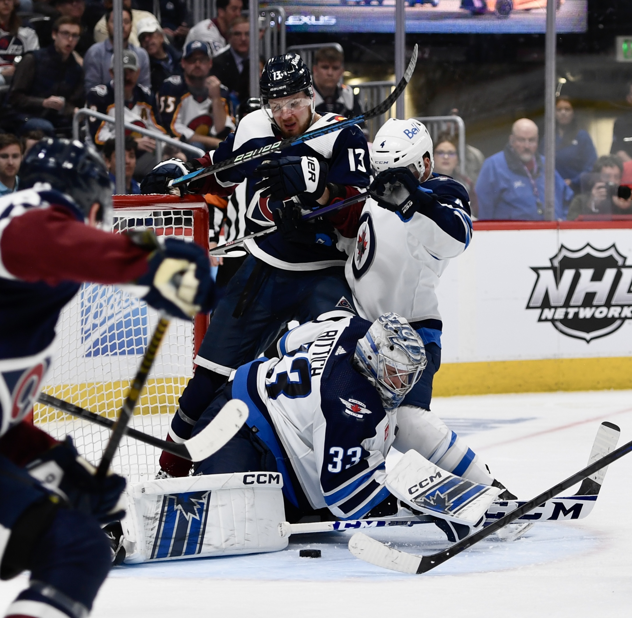 Avs forward Valeri Nichushkin scrambles for a puck in front of Winnipeg's net on Thursday, April 13, 2023. (CarsonFieldcarson.field@gazette.comhttps://secure.gravatar.com/avatar/c524ef3d384945349bed78d70eb2d2cd?d=mm&r=g)