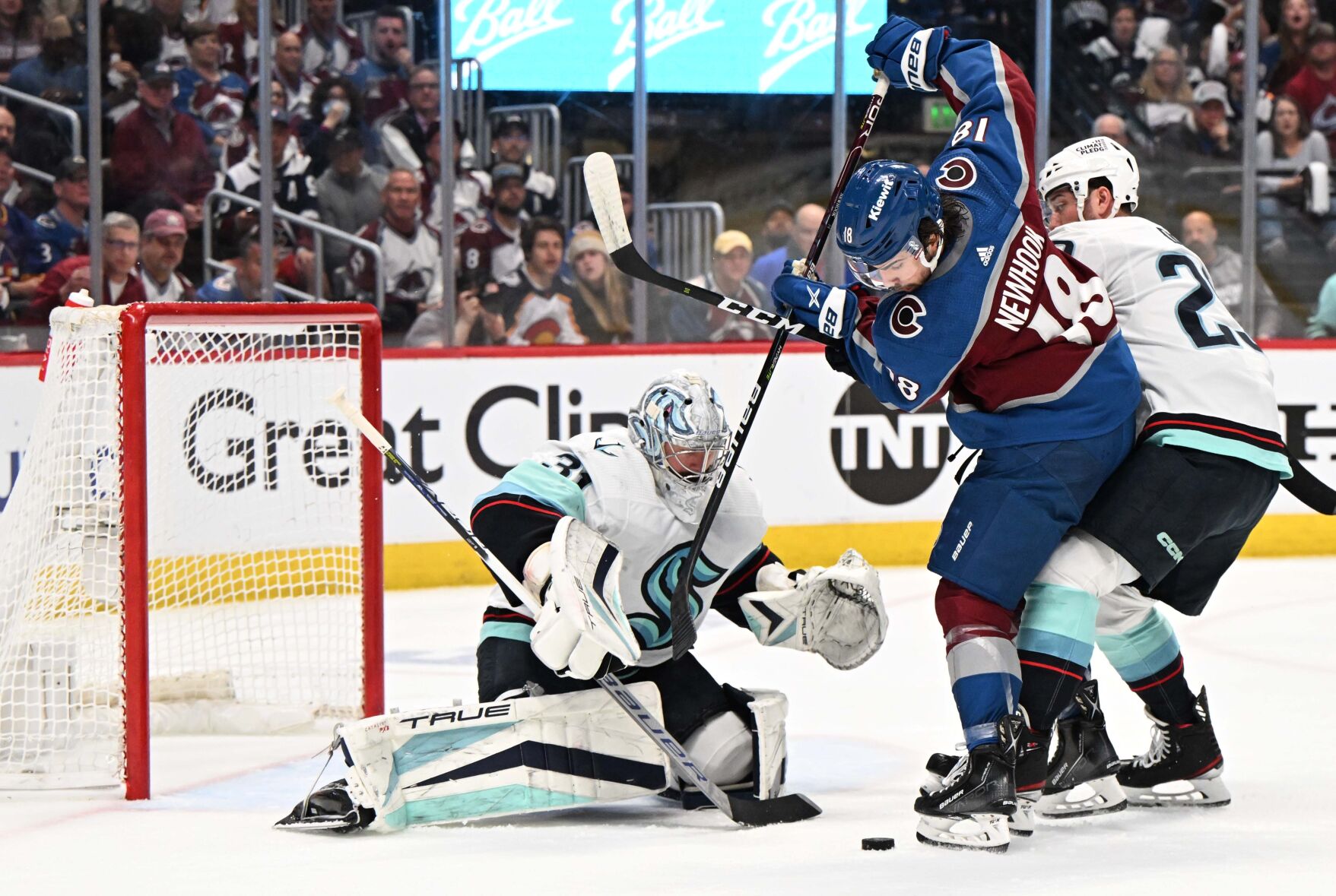 Colorado Avalanche center Alex Newhook (18) looks for a rebound as Seattle Kraken defenseman Vince Dunn (29) and goaltender Philipp Grubauer (31) defend during the first period of Game 7 of the first round of the Stanley Cup Playoffs Sunday, April 30, 2023, at Ball Arena in Denver. (The Gazette, Christian Murdock) (Christian Murdock/The Gazette)