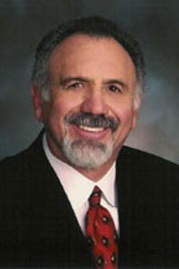 Former 10th Judicial District Chief Judge Dennis Maes