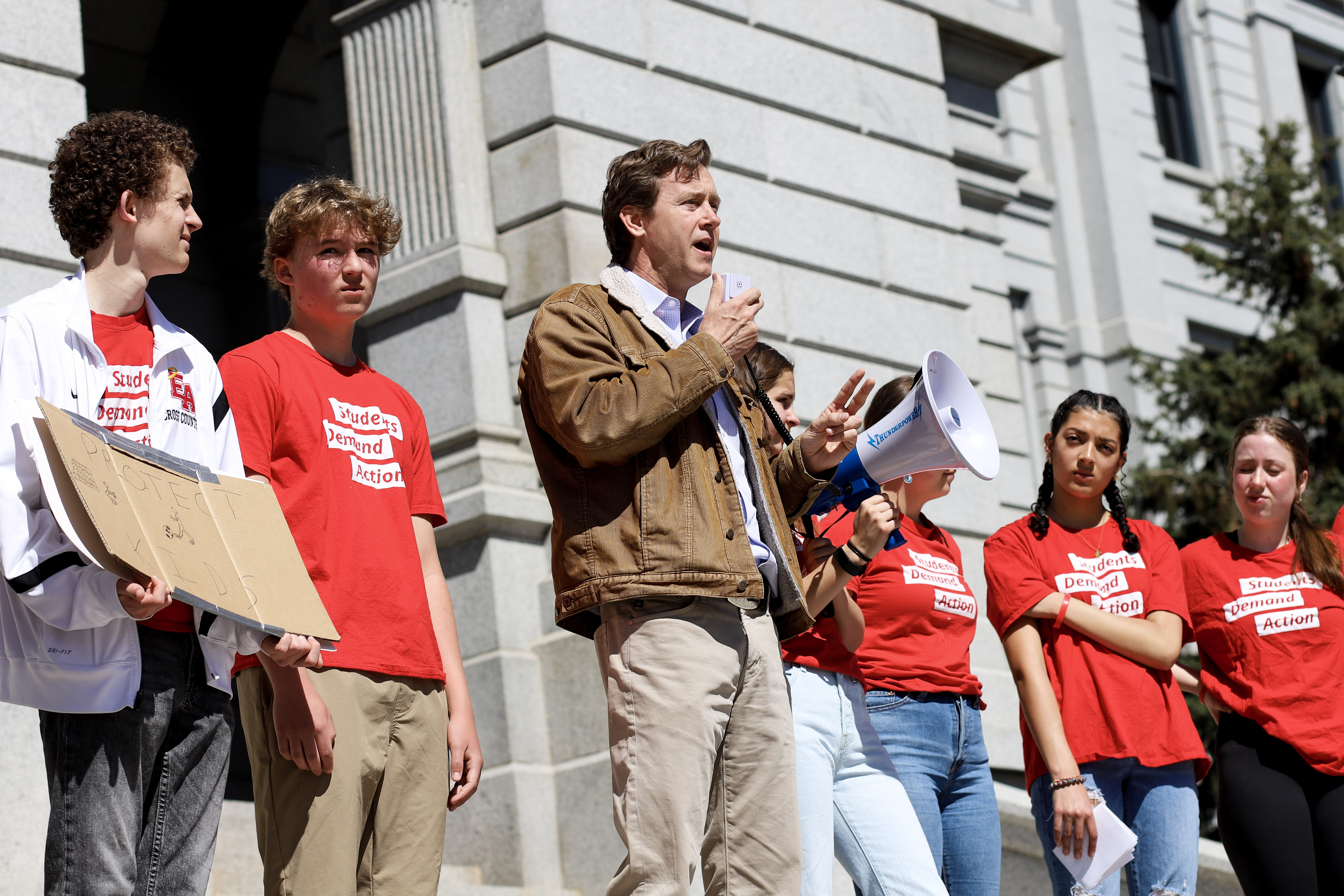 Mike Johnston, Michael Bennet join Students Demand Action on Capitol steps to protest gun violence