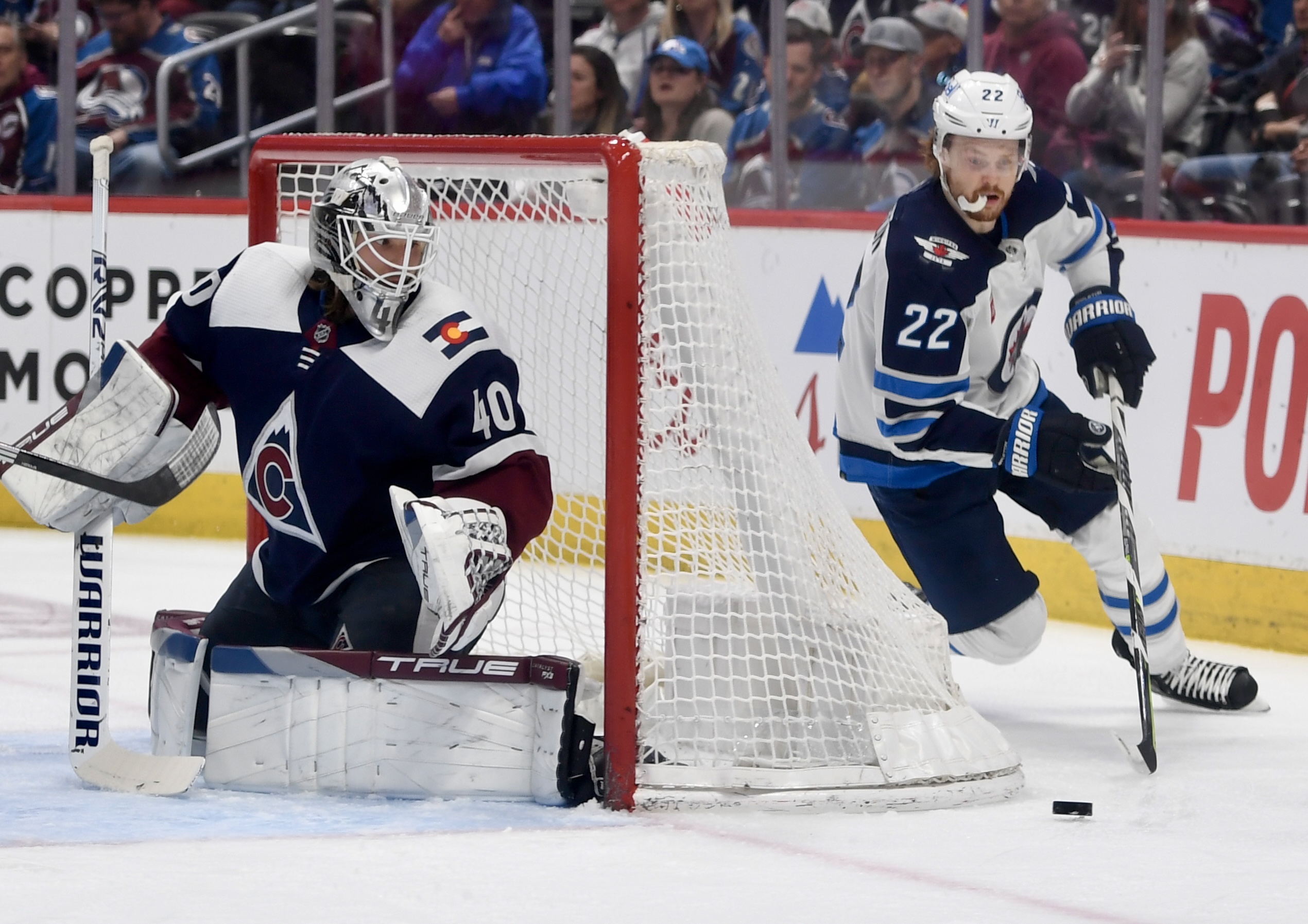 Avs goalie Alexandar Georgiev watches as Winnipeg's Mason Appleton skates behind the net on Thursday, April 13, 2023. (CarsonFieldcarson.field@gazette.comhttps://secure.gravatar.com/avatar/c524ef3d384945349bed78d70eb2d2cd?d=mm&r=g)