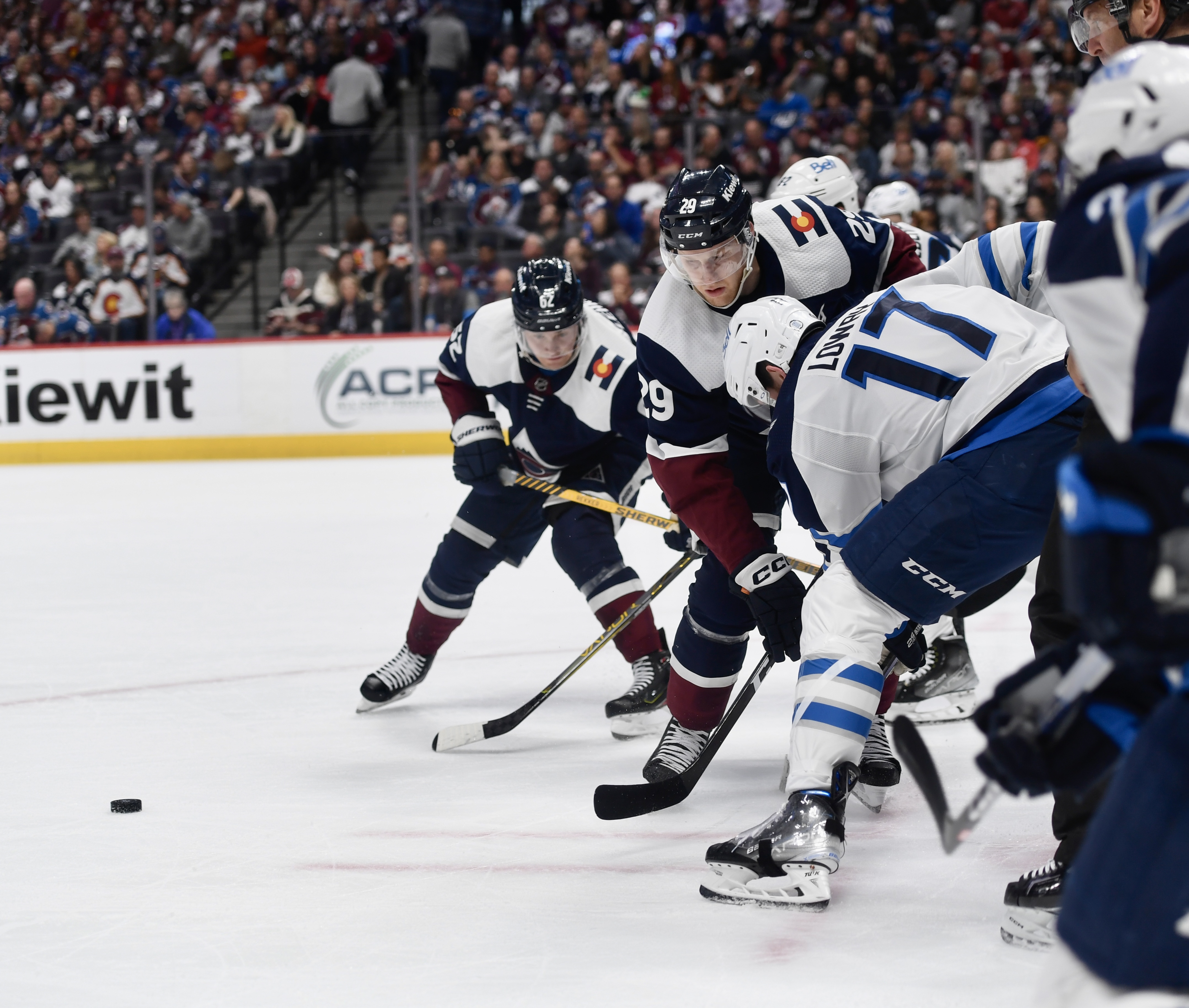 Avs forward Nathan MacKinnon wins a faceoff against the Winnipeg Jets on Thursday, April 13, 2023. (CarsonFieldcarson.field@gazette.comhttps://secure.gravatar.com/avatar/c524ef3d384945349bed78d70eb2d2cd?d=mm&r=g)