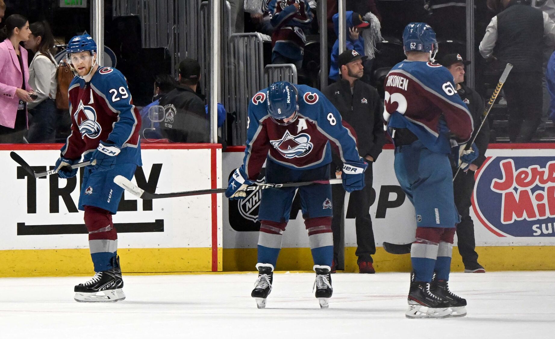 Colorado Avalanche center Nathan MacKinnon (29), defenseman Cale Makar (8) and left wing Artturi Lehkonen (62) stand on the ice after losing to the Seattle Kraken in Game 7 of the first round of the Stanley Cup Playoffs Sunday, April 30, 2023, at Ball Arena in Denver. The Seattle Kraken won 2-1 to advance in playoffs. (The Gazette, Christian Murdock) (Christian Murdock/The Gazette)