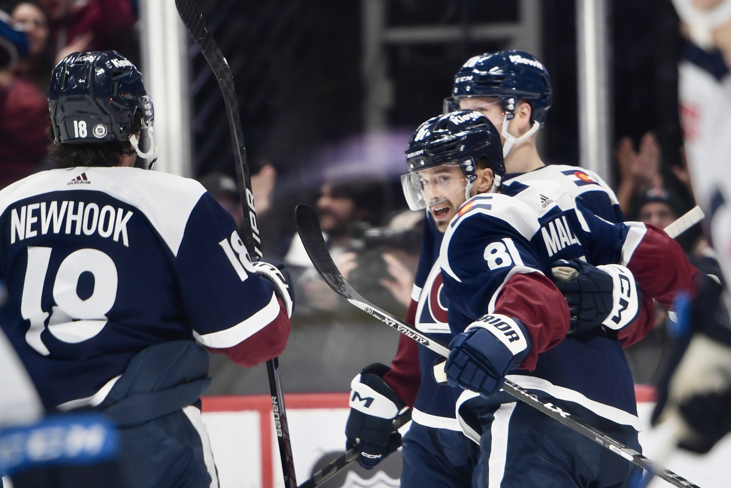 Avs forward Denis Malgin celebrates with teammates after scoring a goal against the Winnipeg Jets on Thursday, April 13, 2023. (CarsonFieldcarson.field@gazette.comhttps://secure.gravatar.com/avatar/c524ef3d384945349bed78d70eb2d2cd?d=mm&r=g)