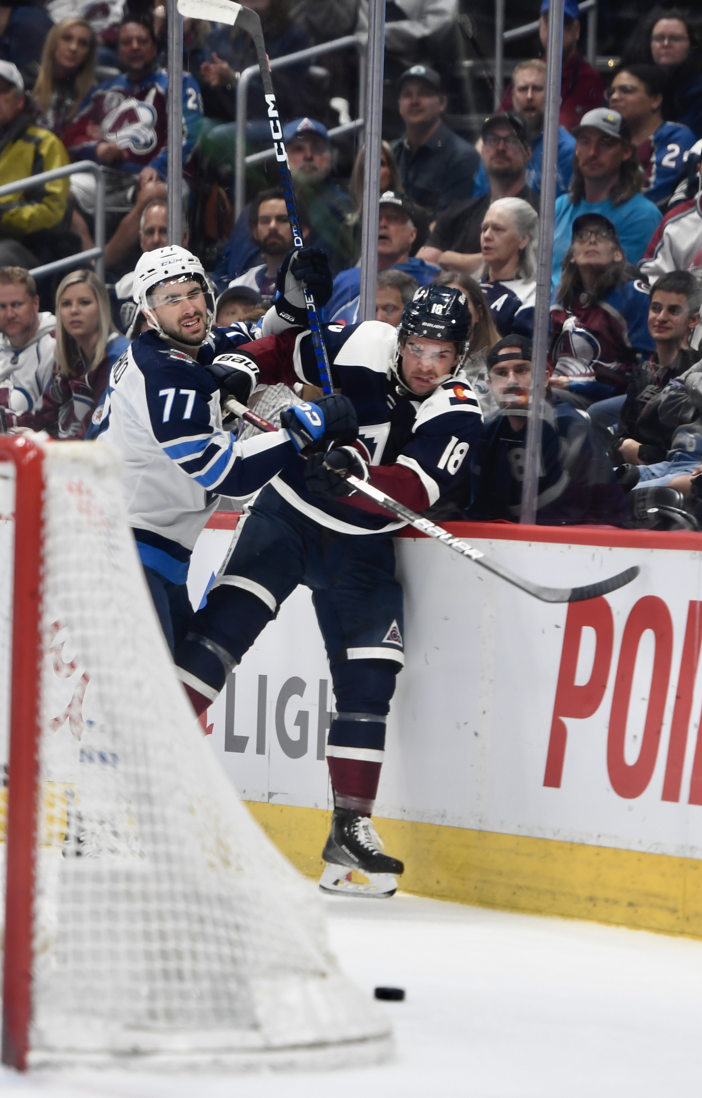 Avs forward Alex Newhook gets pinned on the boards by Winnipeg's Kyle Capobianco on Thursday, April 13, 2023. (CarsonFieldcarson.field@gazette.comhttps://secure.gravatar.com/avatar/c524ef3d384945349bed78d70eb2d2cd?d=mm&r=g)