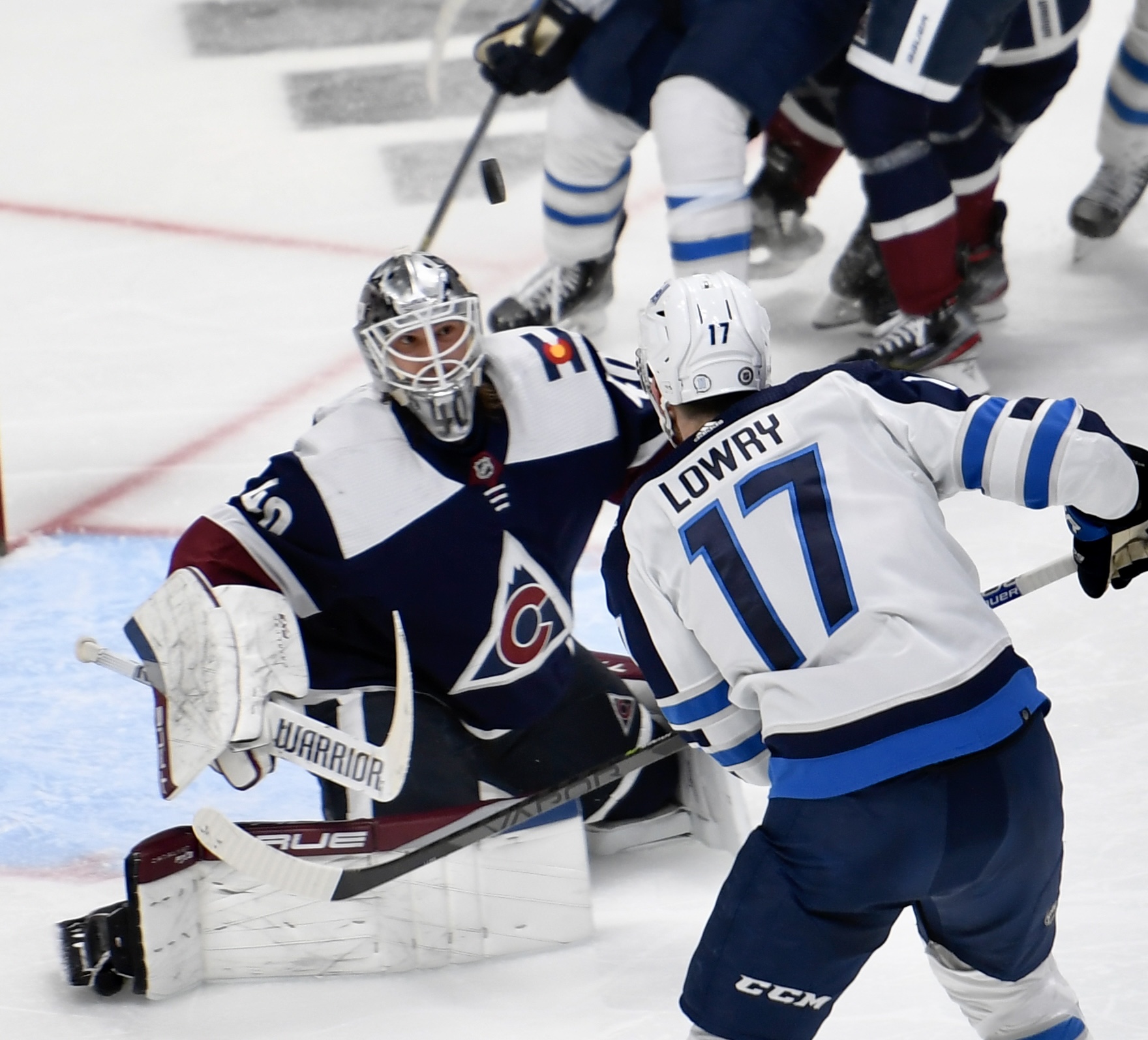 Avs goalie Alexandar Georgiev stops a shot from Winnipeg's Adam Lowry on Thursday, April 13, 2023. (CarsonFieldcarson.field@gazette.comhttps://secure.gravatar.com/avatar/c524ef3d384945349bed78d70eb2d2cd?d=mm&r=g)