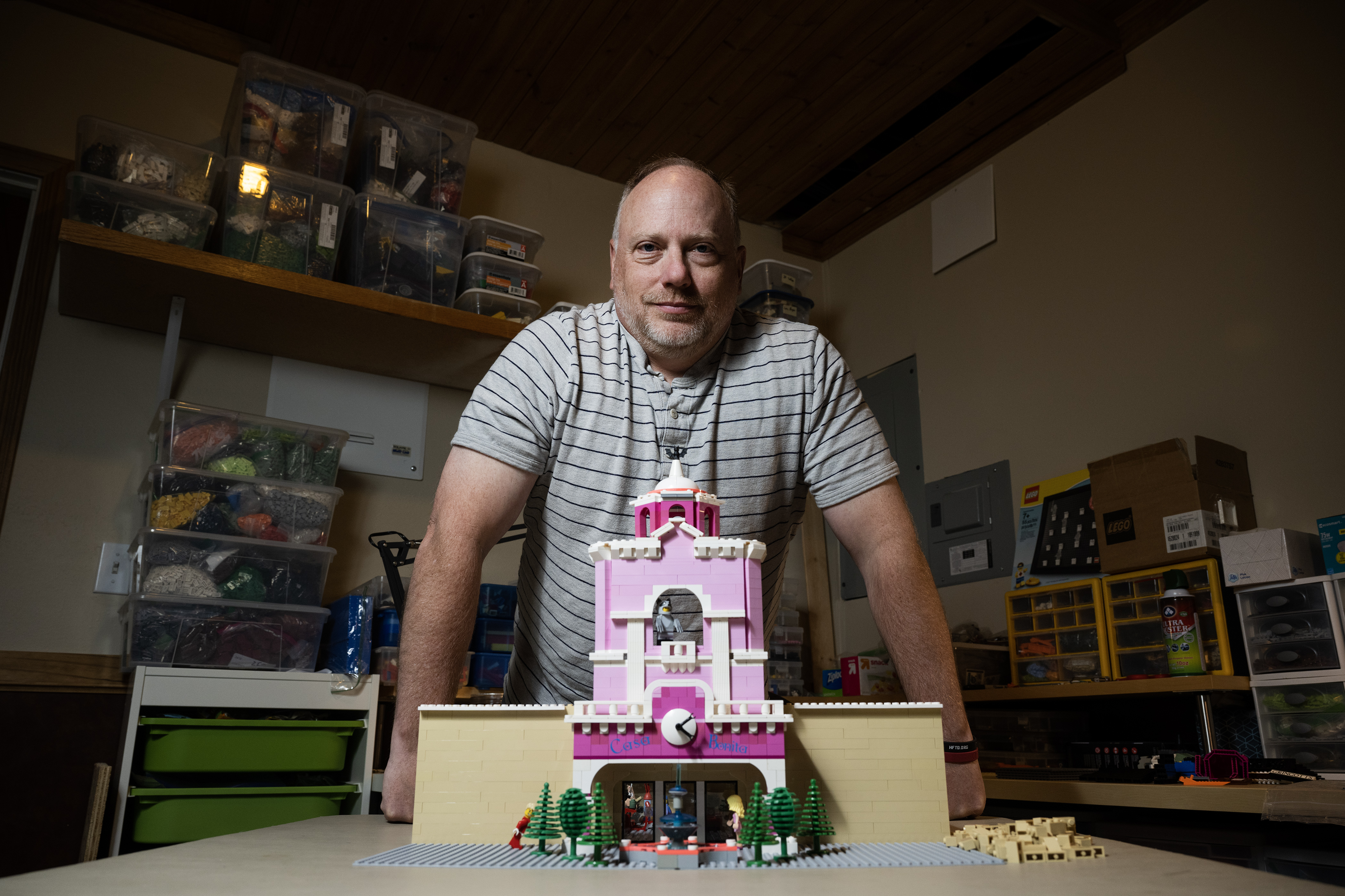 Art Rodgers stands for a portrait in his workshop with the Lego display of Casa Bonita he built for History Colorado last summer, as seen on Monday, May 8, 2023, at his home in Longmont, Colo. (Timothy Hurst/Denver Gazette) (TimHursttim.hurst@gazette.comhttps://secure.gravatar.com/avatar/aca82bd62b4ee425c598527cd6faa1b1?d=mm&r=g)