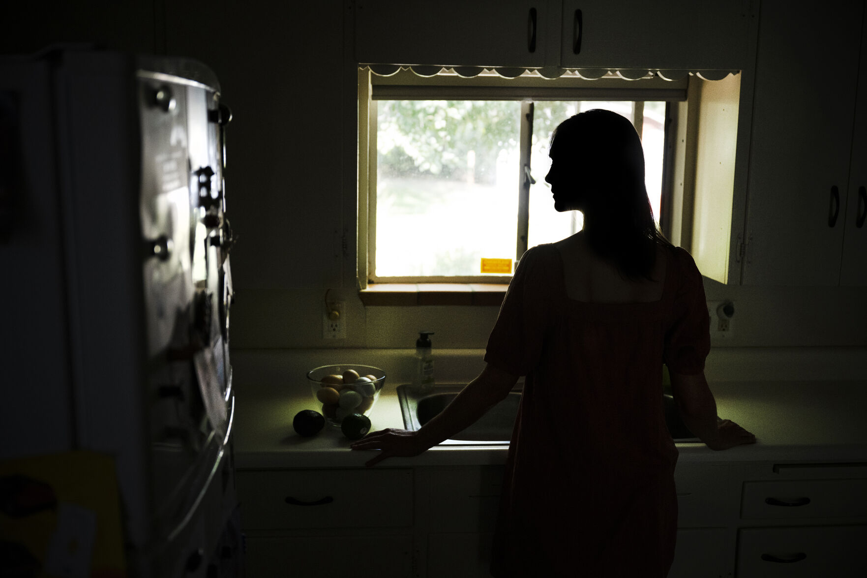 Mary went through a process of having a custody evaluation done by a psychotherapist in 2016. She has said the mental health professional who performed the evaluation did not document a history of abuse by her ex-partner, with whom she shares a 12-year-old son. Mary, using a pseudonym at her request, stands for a portrait in her home on Friday, August 5, 2022, in Denver, Colo. (Timothy Hurst/The Denver Gazette) (Timothy Hurst)