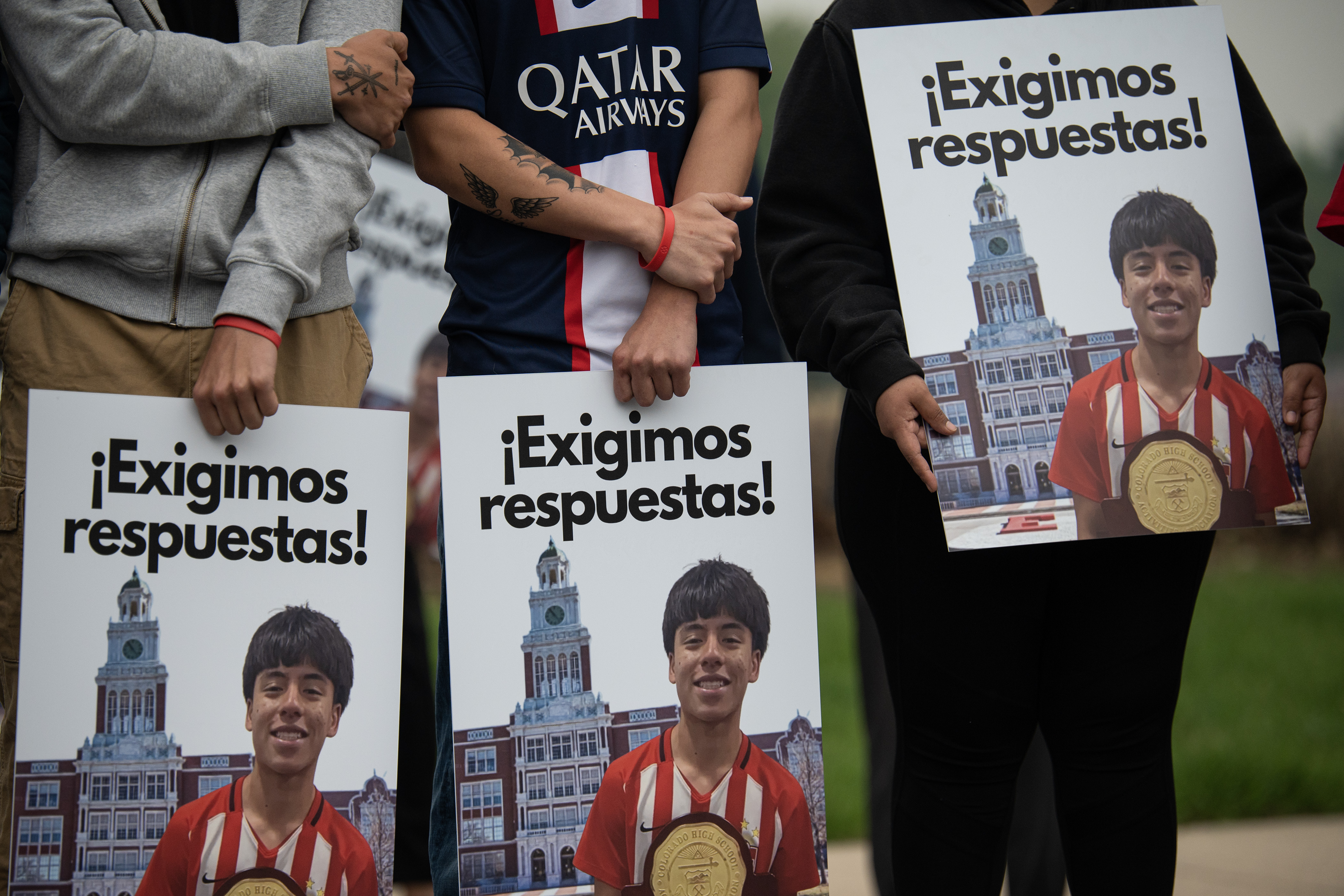 Family and friends of Luis Garcia, who was shot on February 13th in front of the school and died two weeks later from his injuries, hold signs with Garcia during a press conference in front of the Thatcher Memorial Fountain on Friday, May 19, 2023, at City Park in Denver. (Timothy Hurst/Denver Gazette) (TimHursttim.hurst@gazette.comhttps://secure.gravatar.com/avatar/aca82bd62b4ee425c598527cd6faa1b1?d=mm&r=g)