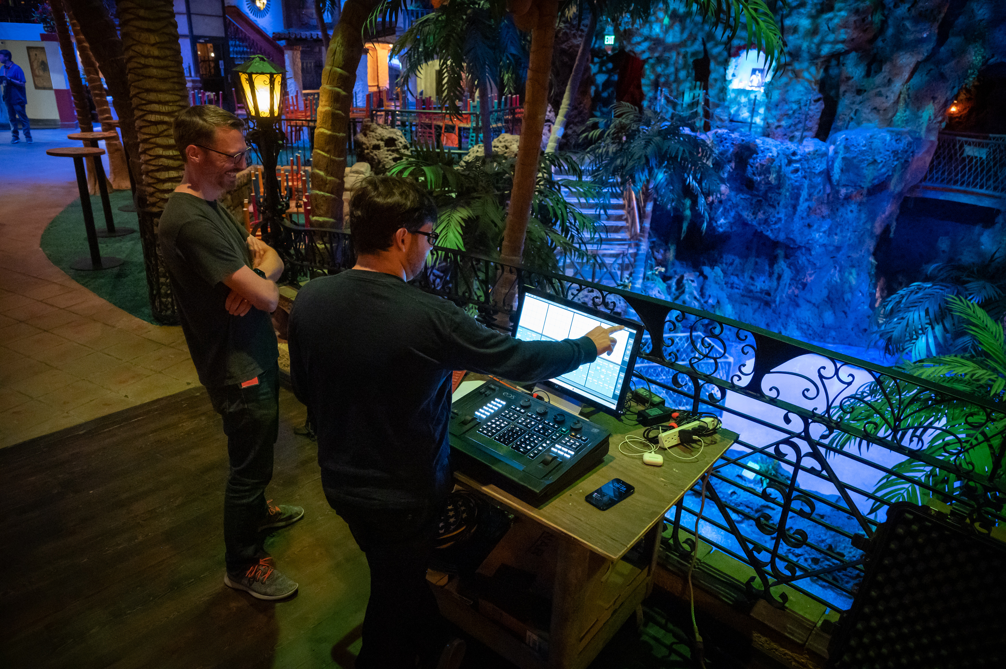 Workers are seen working on the lighting on a bridge at Casa Bonita in this handout photo provided on May 26, 2023. (Casa Bonita)