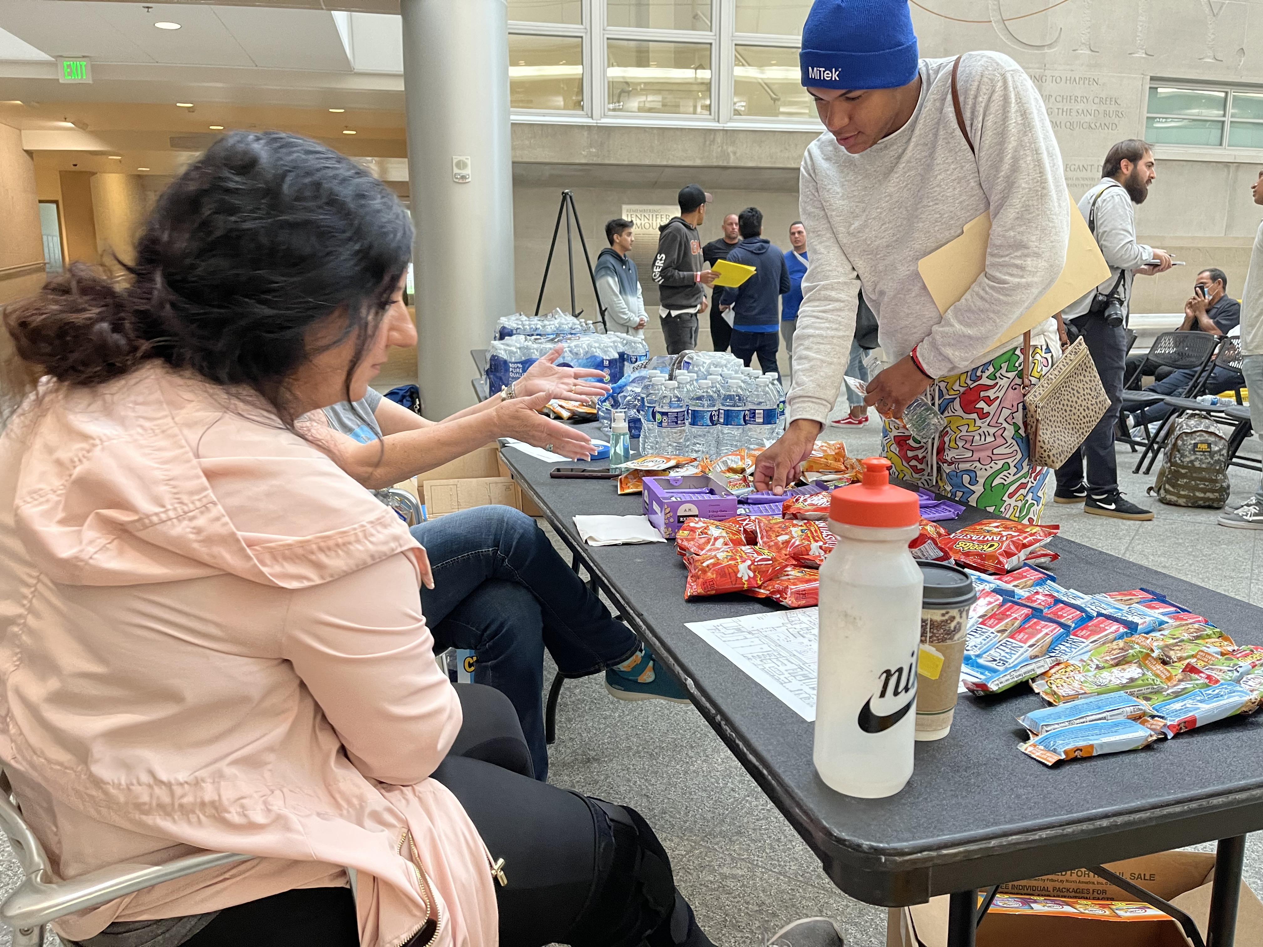 A man grabs a snack at Denver’s immigrant reception center on Thursday, May 11, 2023. (NicoBrambilanico.brambila@denvergazette.comhttps://denvergazette.com/content/tncms/avatars/4/ec/74a/4ec74aa2-71b0-11ed-af6f-0f0ae7acf7b0.d52fca74e95503d77da50127c9ff4e2d.png)